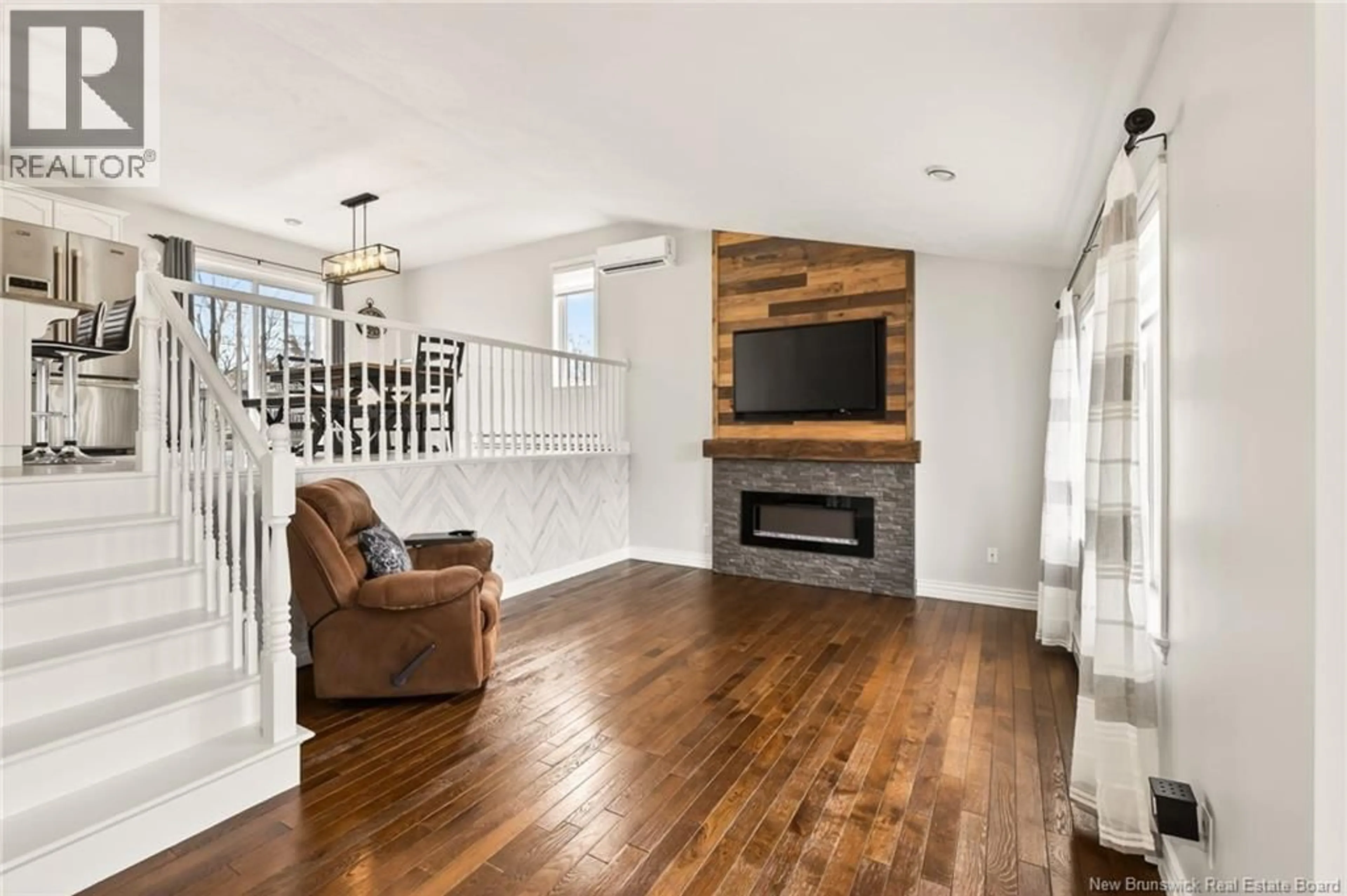 Living room with furniture, wood/laminate floor for 11 DARLA COURT, Moncton New Brunswick E1A8B6