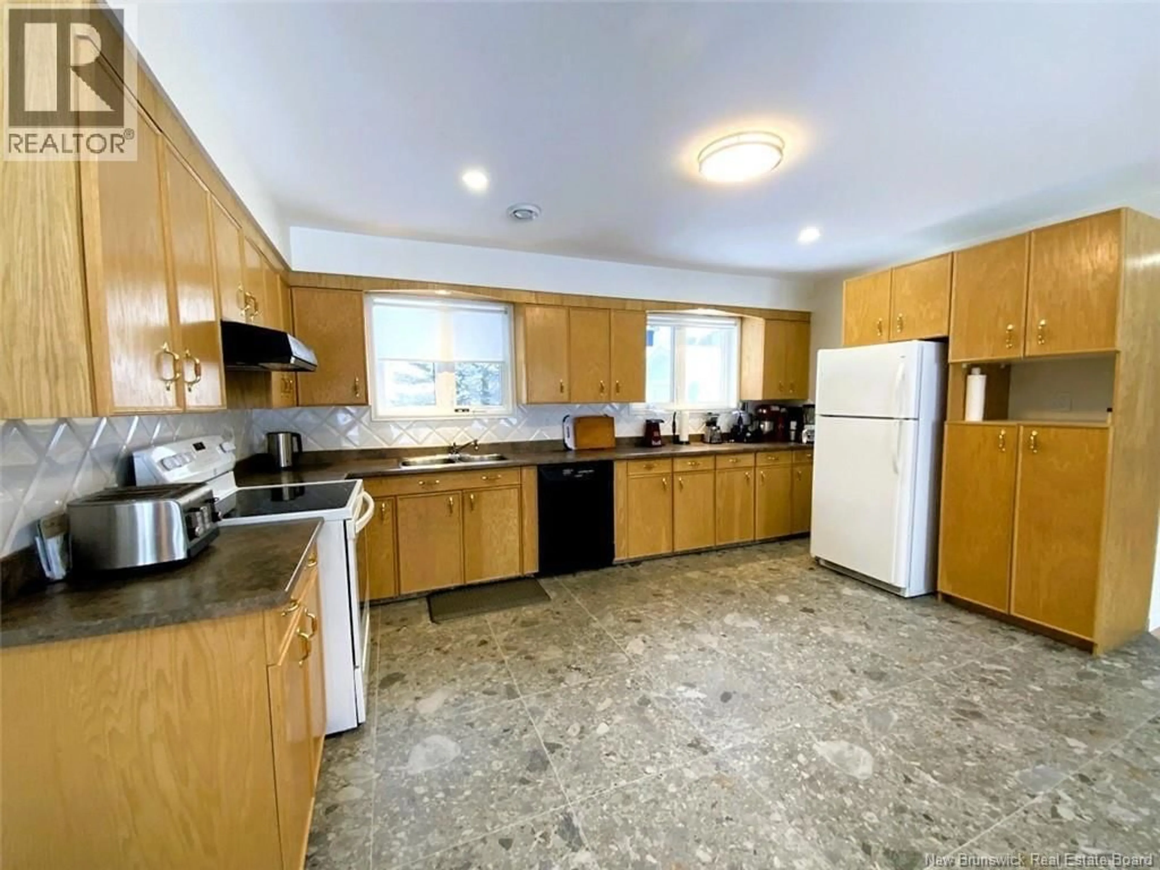 Standard kitchen, unknown for 64 CHOUINARD AVENUE, Edmundston New Brunswick E3V3L8