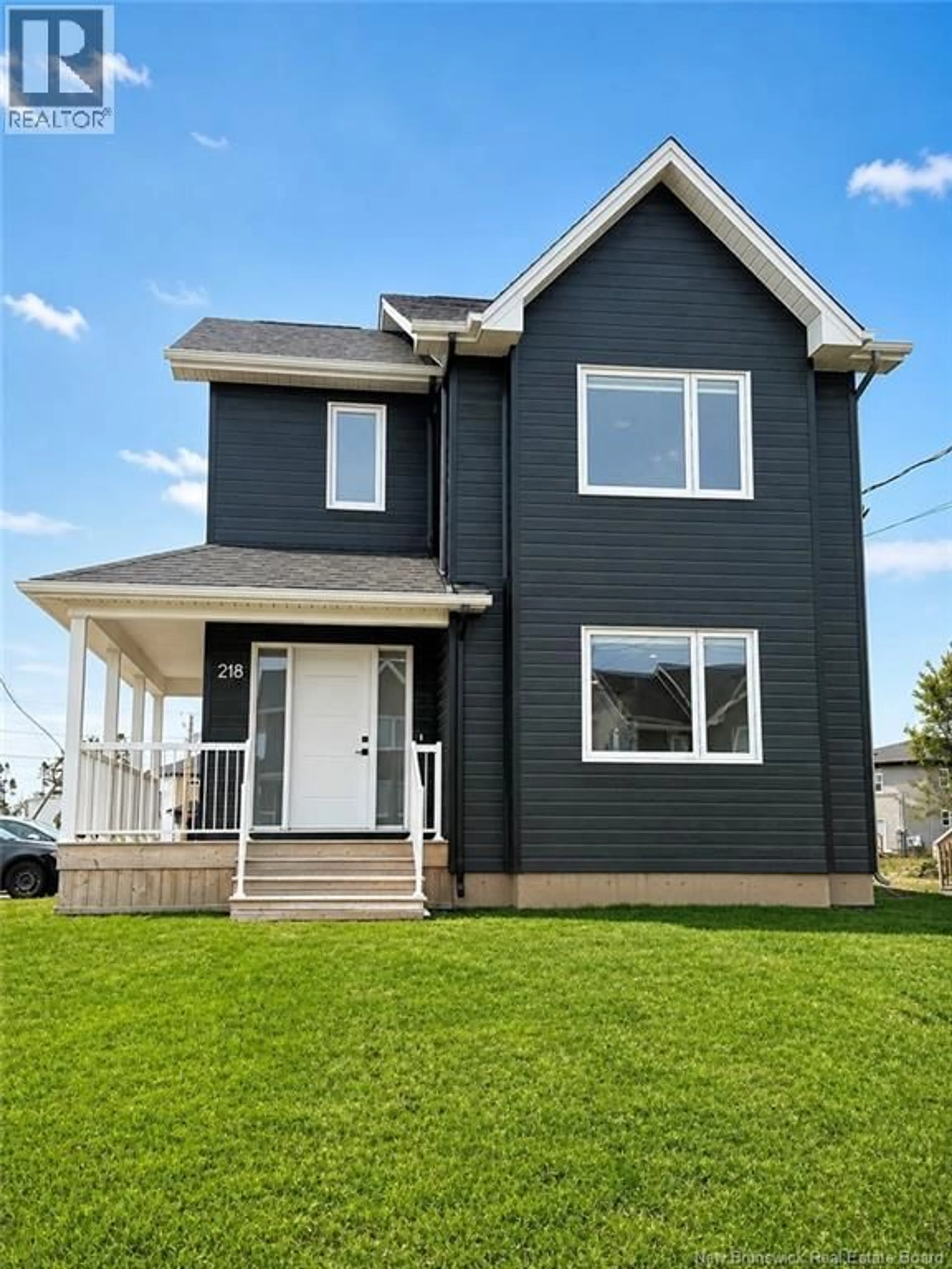 Home with vinyl exterior material, street for 218 FALCON DRIVE, Moncton New Brunswick E1H0H8