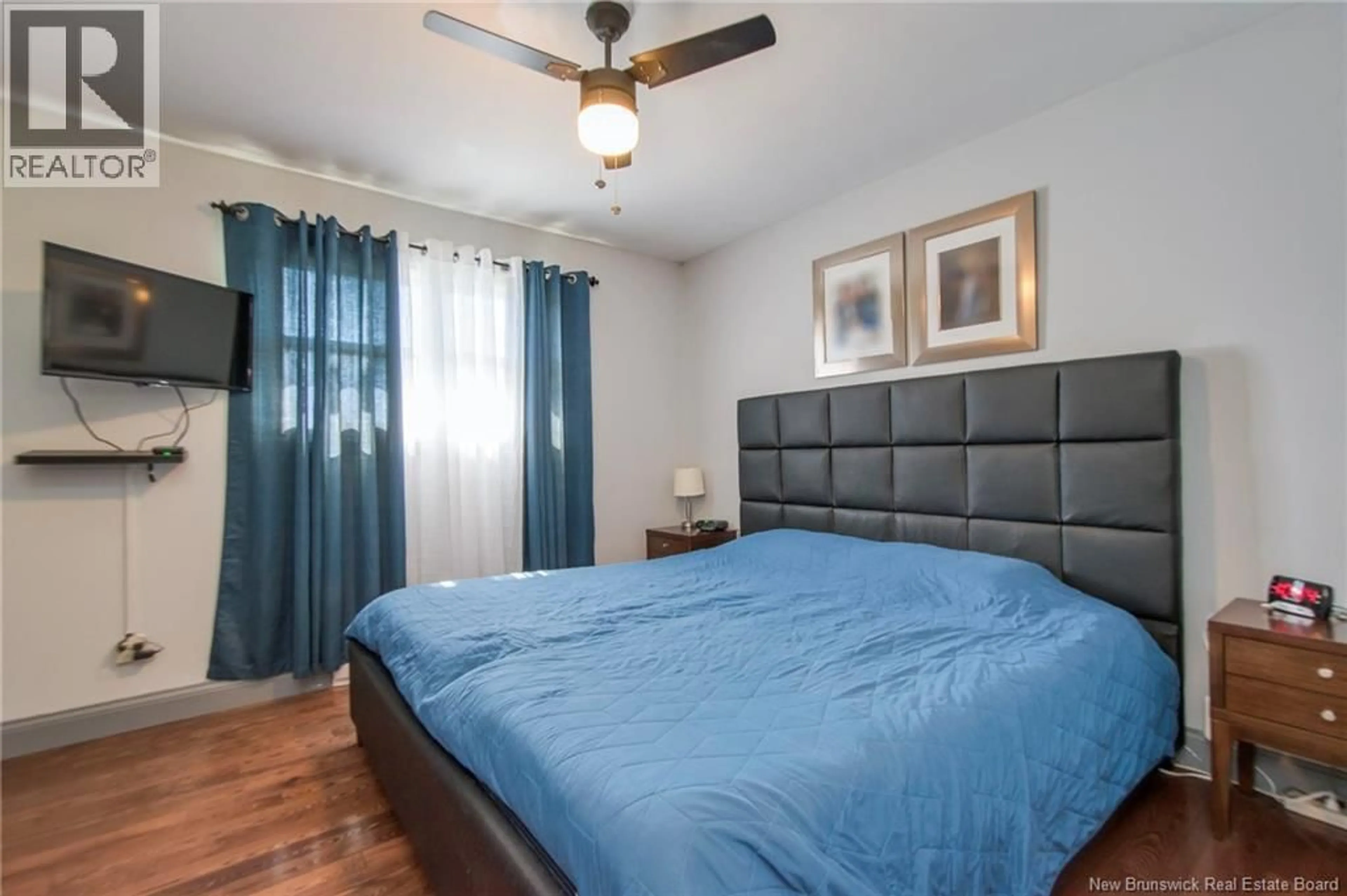 Bedroom with bed, wood/laminate floor for 1201 ROTHESAY ROAD, Saint John New Brunswick E2H2H9