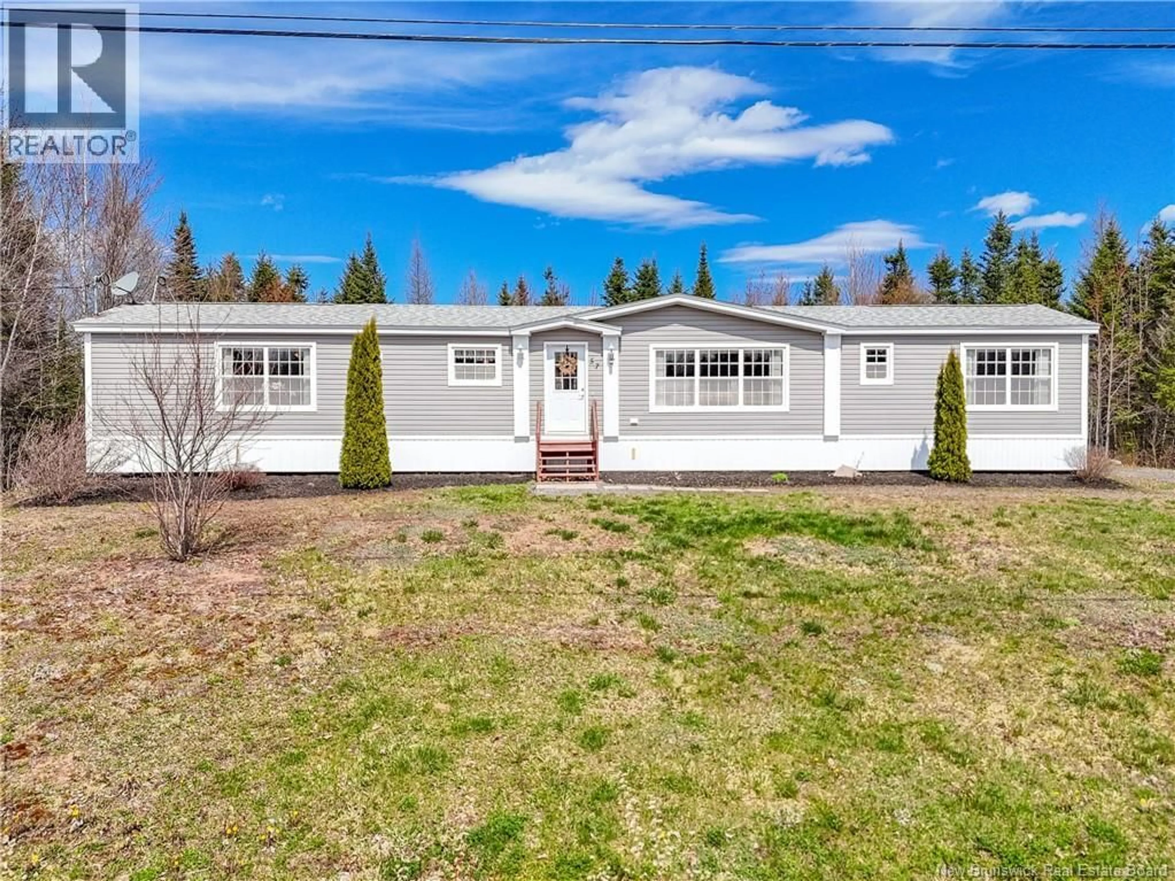 Home with vinyl exterior material, street for 57 CARRIE STREET, Rusagonis New Brunswick E3B0T2