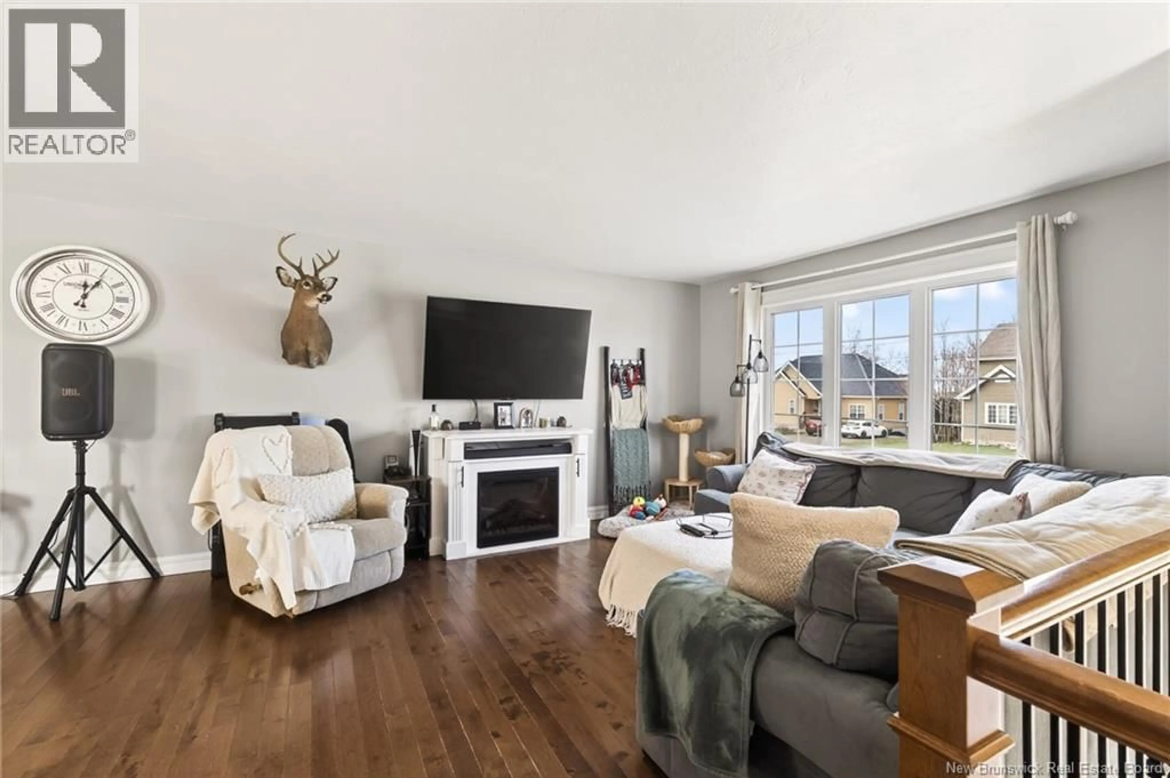 Living room with furniture, wood/laminate floor for 196 LORETTE STREET, Dieppe New Brunswick E1A0E2