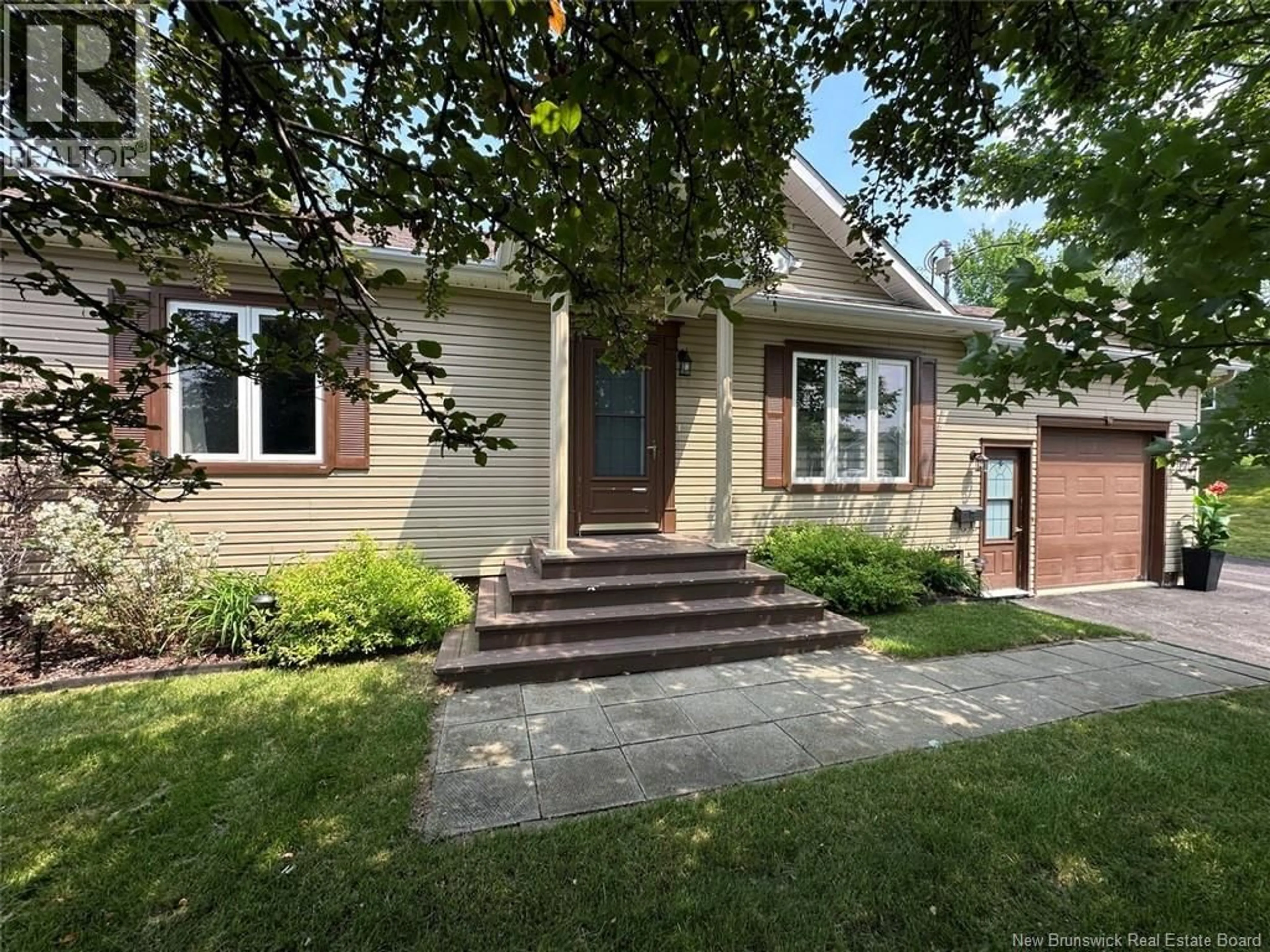 Home with brick exterior material, street for 66 DES PRÉS STREET, Edmundston New Brunswick E3V5A7