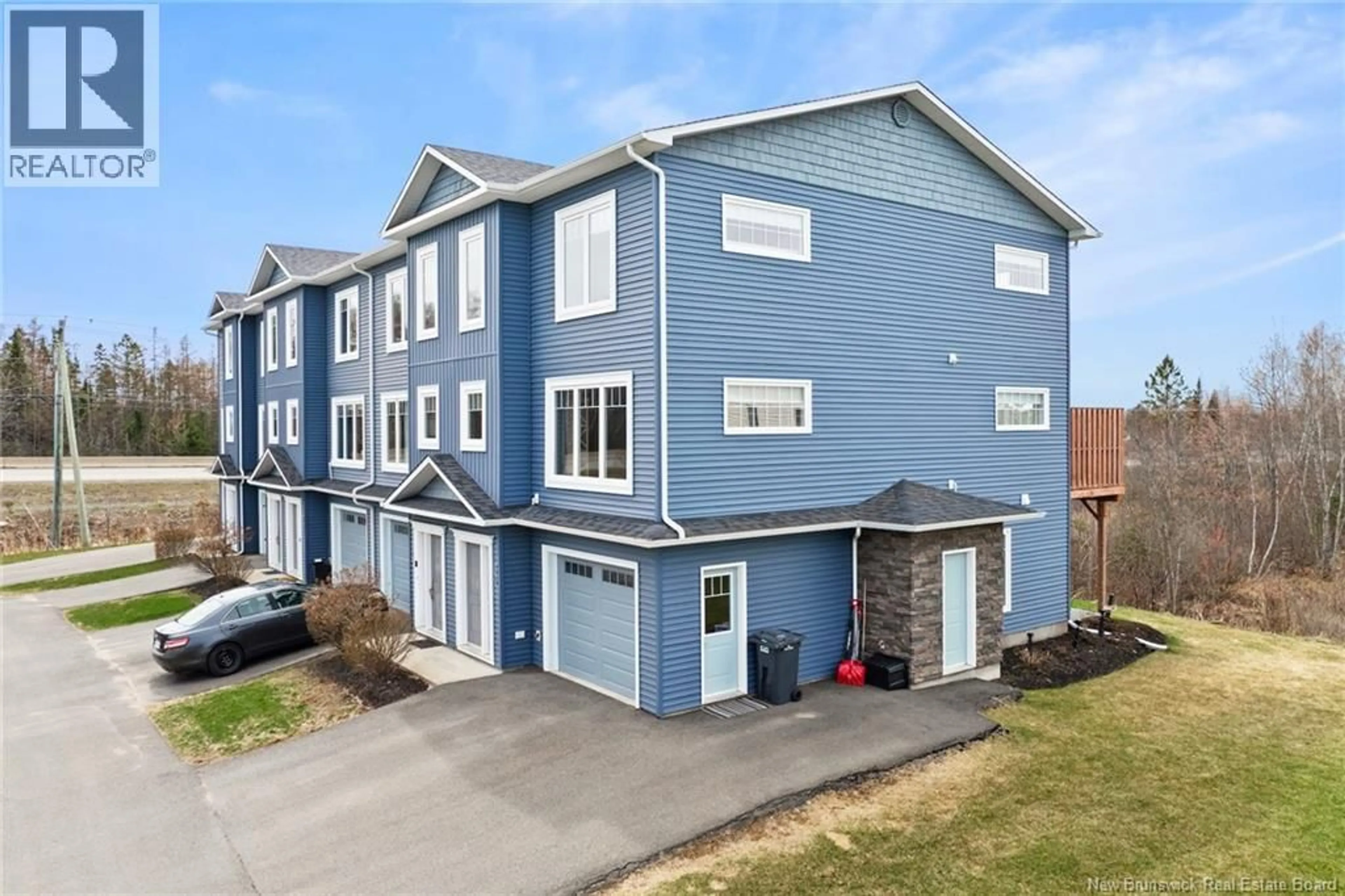A pic from outside/outdoor area/front of a property/back of a property/a pic from drone, unknown for 50 MIA CIRCLE, Fredericton New Brunswick E3A7N5