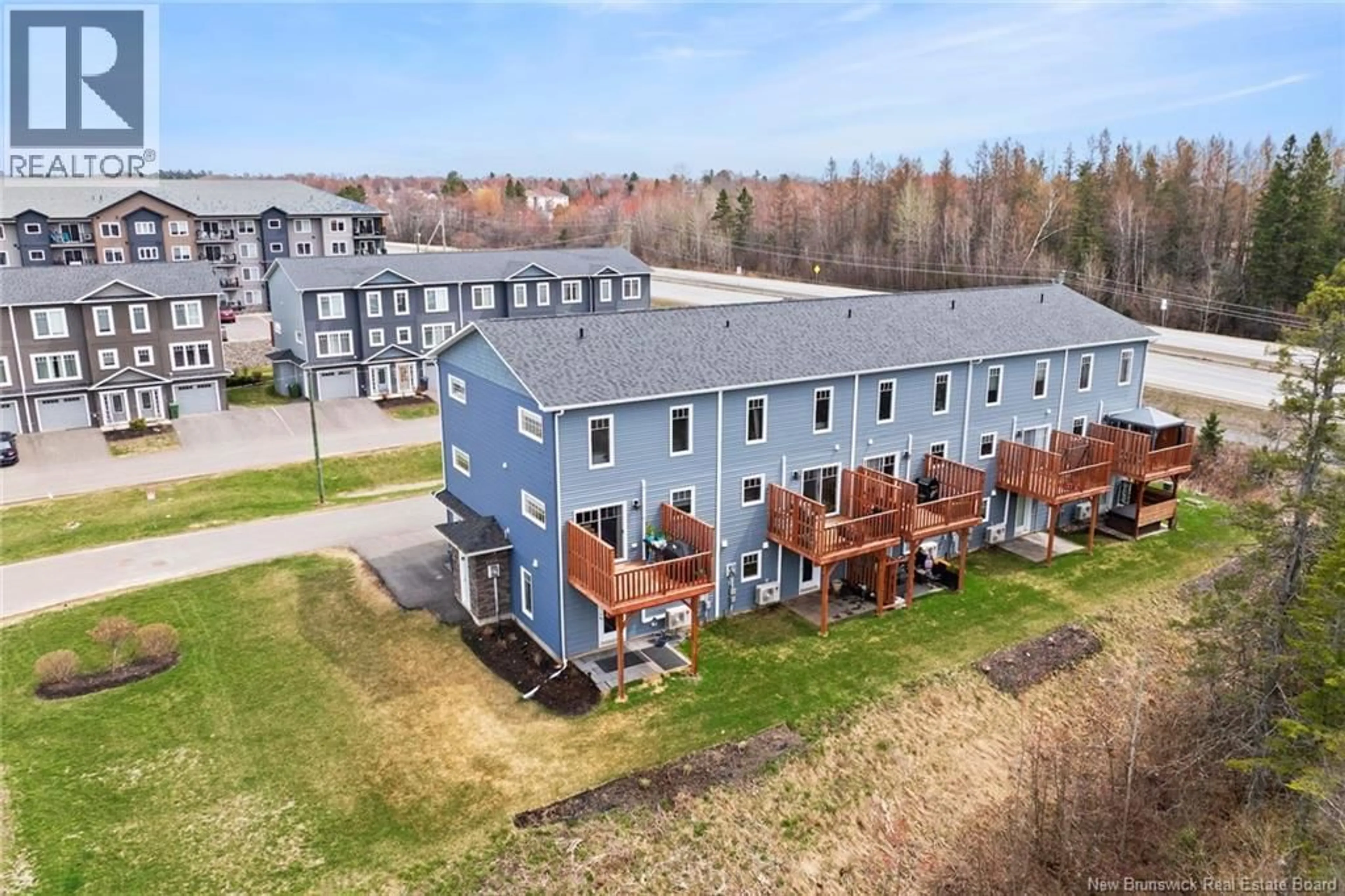 A pic from outside/outdoor area/front of a property/back of a property/a pic from drone, unknown for 50 MIA CIRCLE, Fredericton New Brunswick E3A7N5