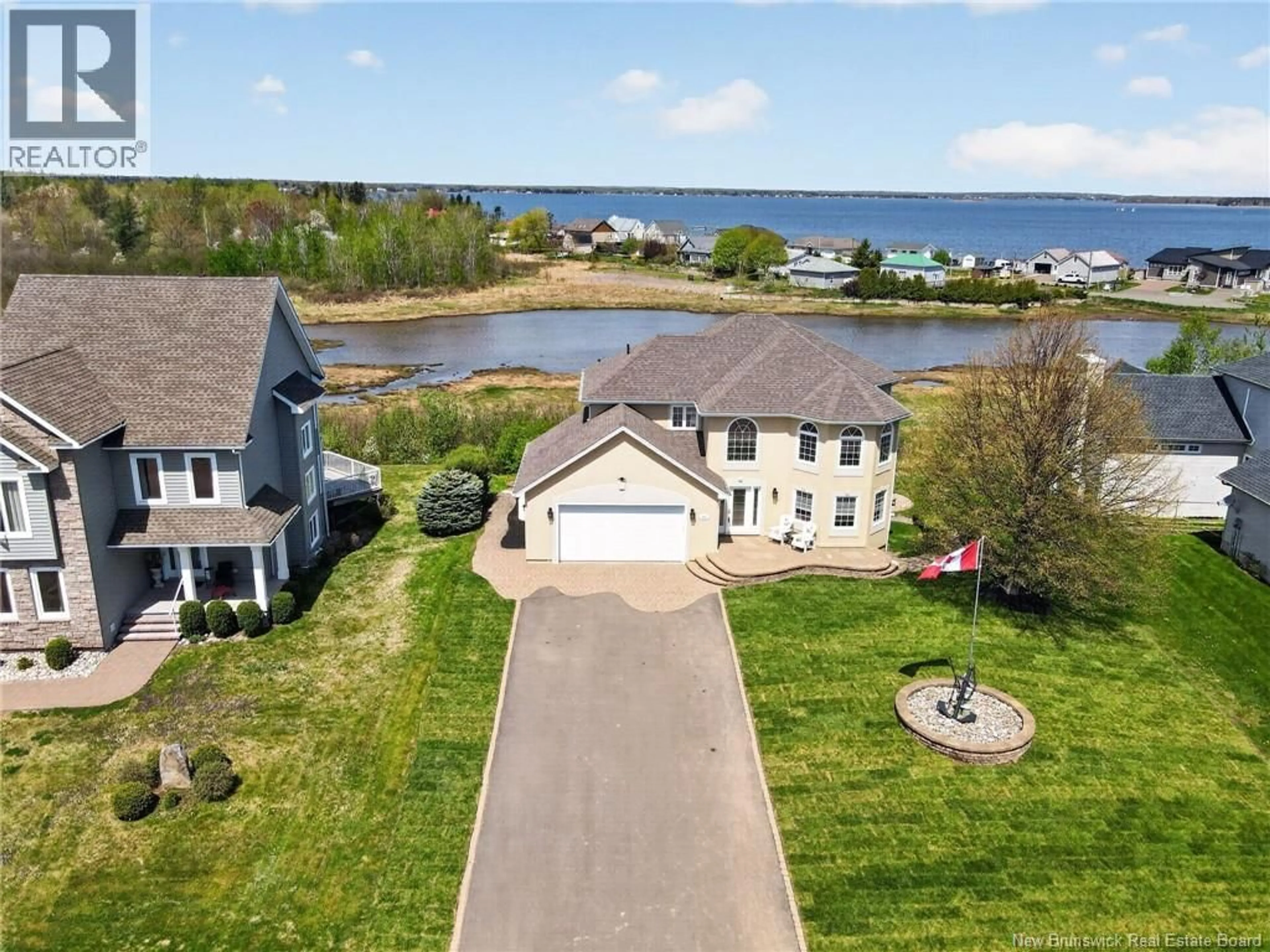 A pic from outside/outdoor area/front of a property/back of a property/a pic from drone, water/lake/river/ocean view for 488 WAYNE ST, Shediac New Brunswick E4P2W9