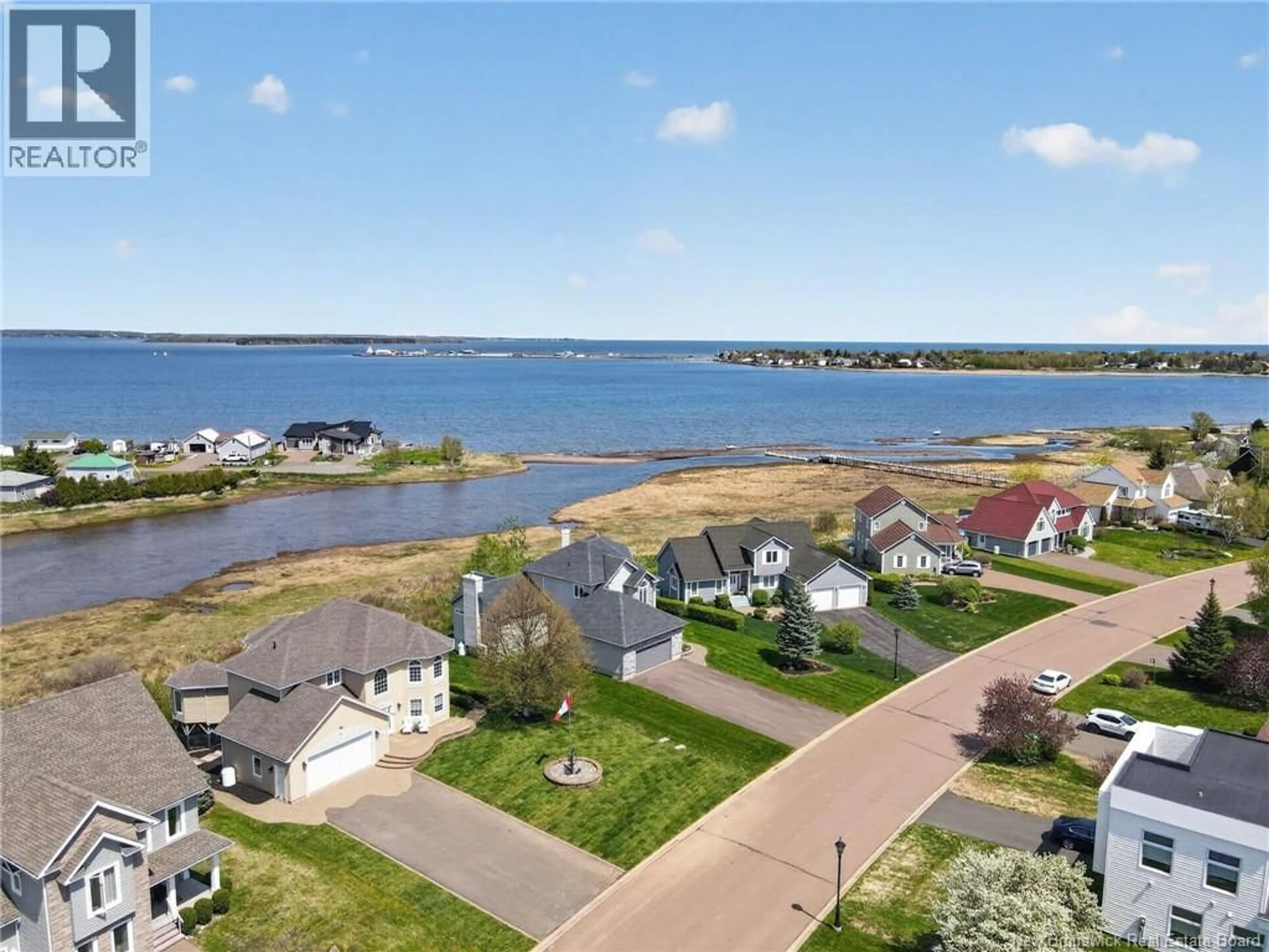 A pic from outside/outdoor area/front of a property/back of a property/a pic from drone, water/lake/river/ocean view for 488 WAYNE ST, Shediac New Brunswick E4P2W9
