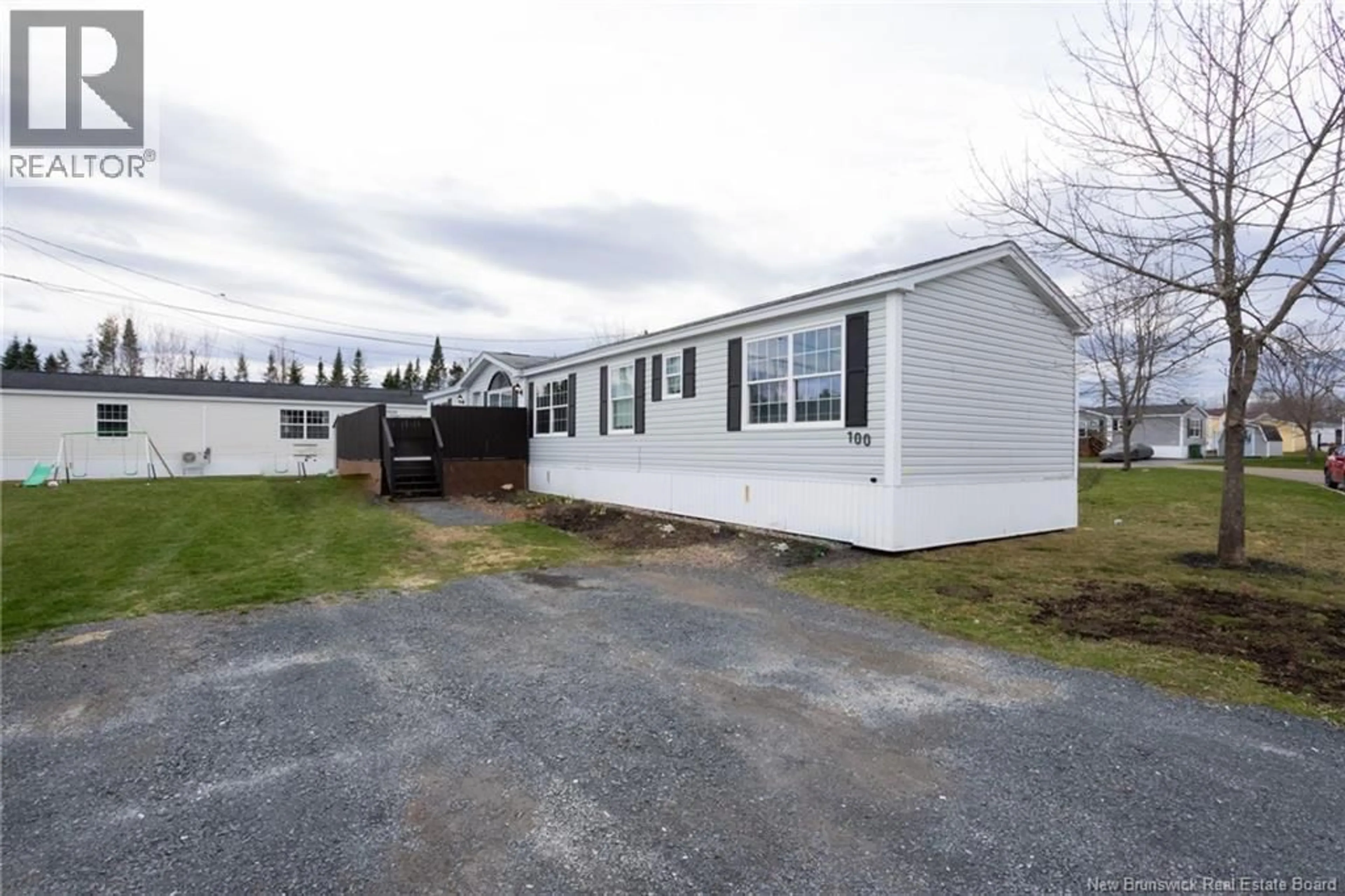 Home with vinyl exterior material, street for 100 DOUGNORTH STREET, Fredericton New Brunswick E3G0X2