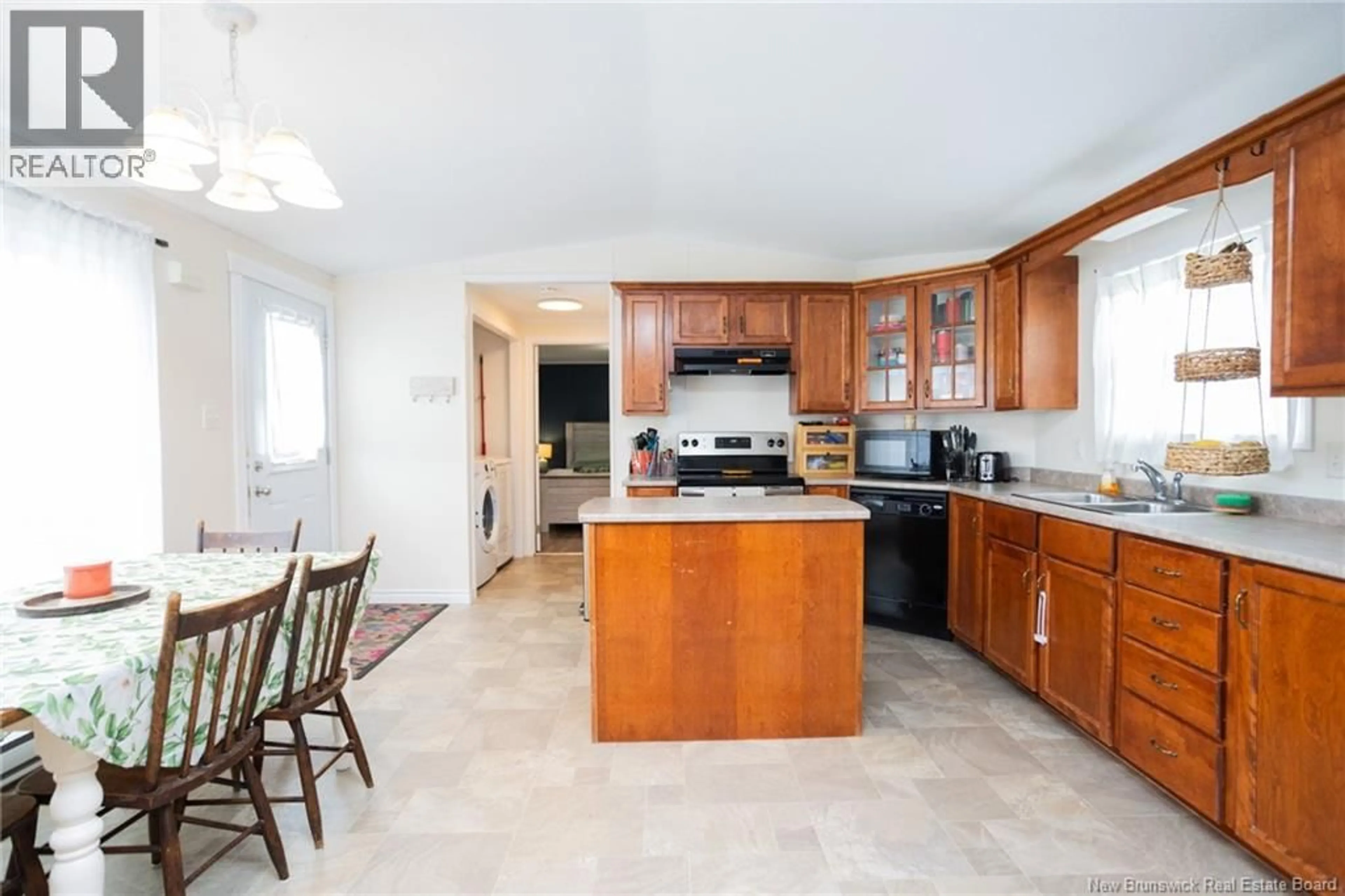 Open concept kitchen, ceramic/tile floor for 100 DOUGNORTH STREET, Fredericton New Brunswick E3G0X2