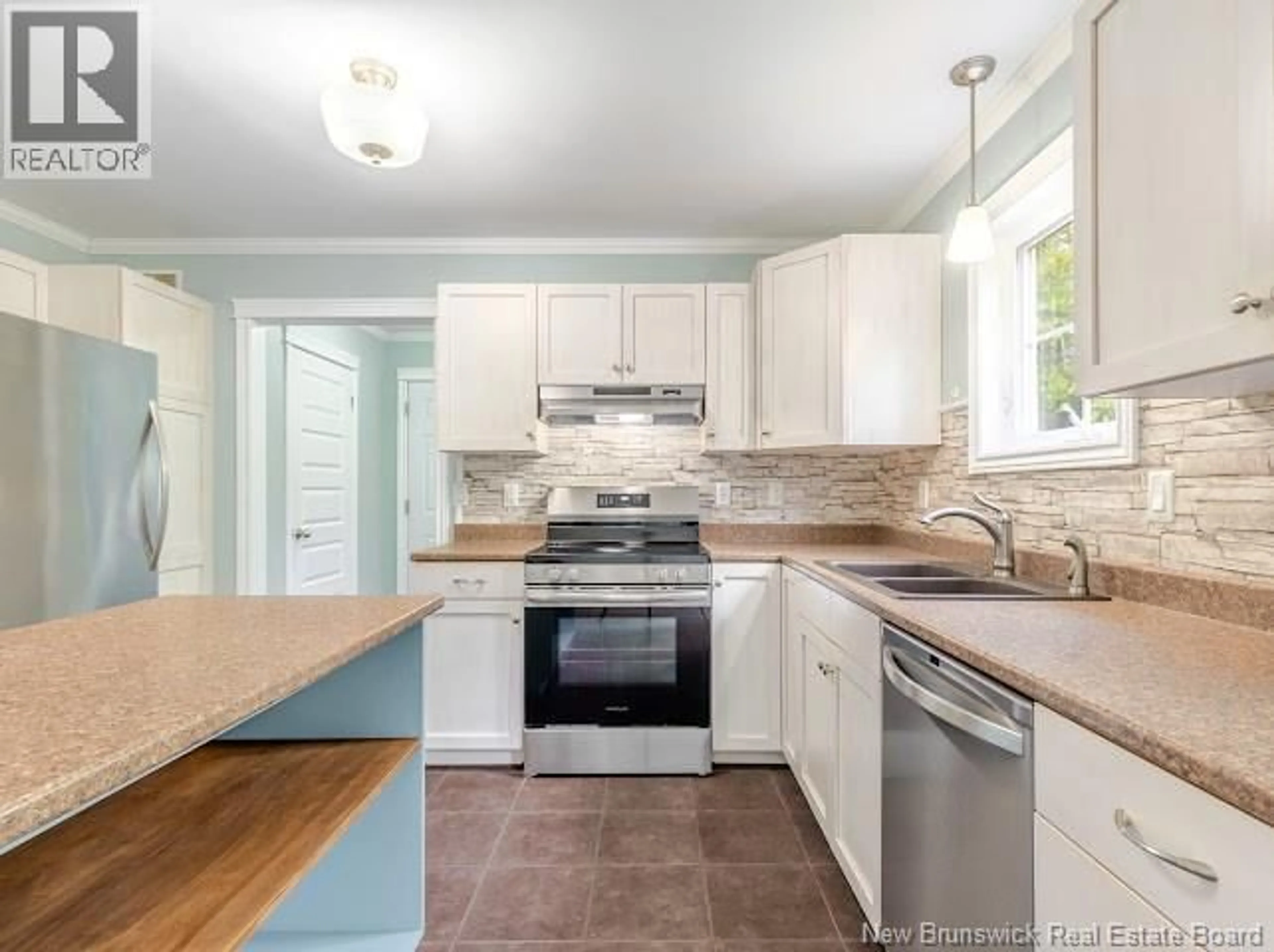 Open concept kitchen, ceramic/tile floor for 82 ALDEN AVENUE, Richibucto Road New Brunswick E3A8T1