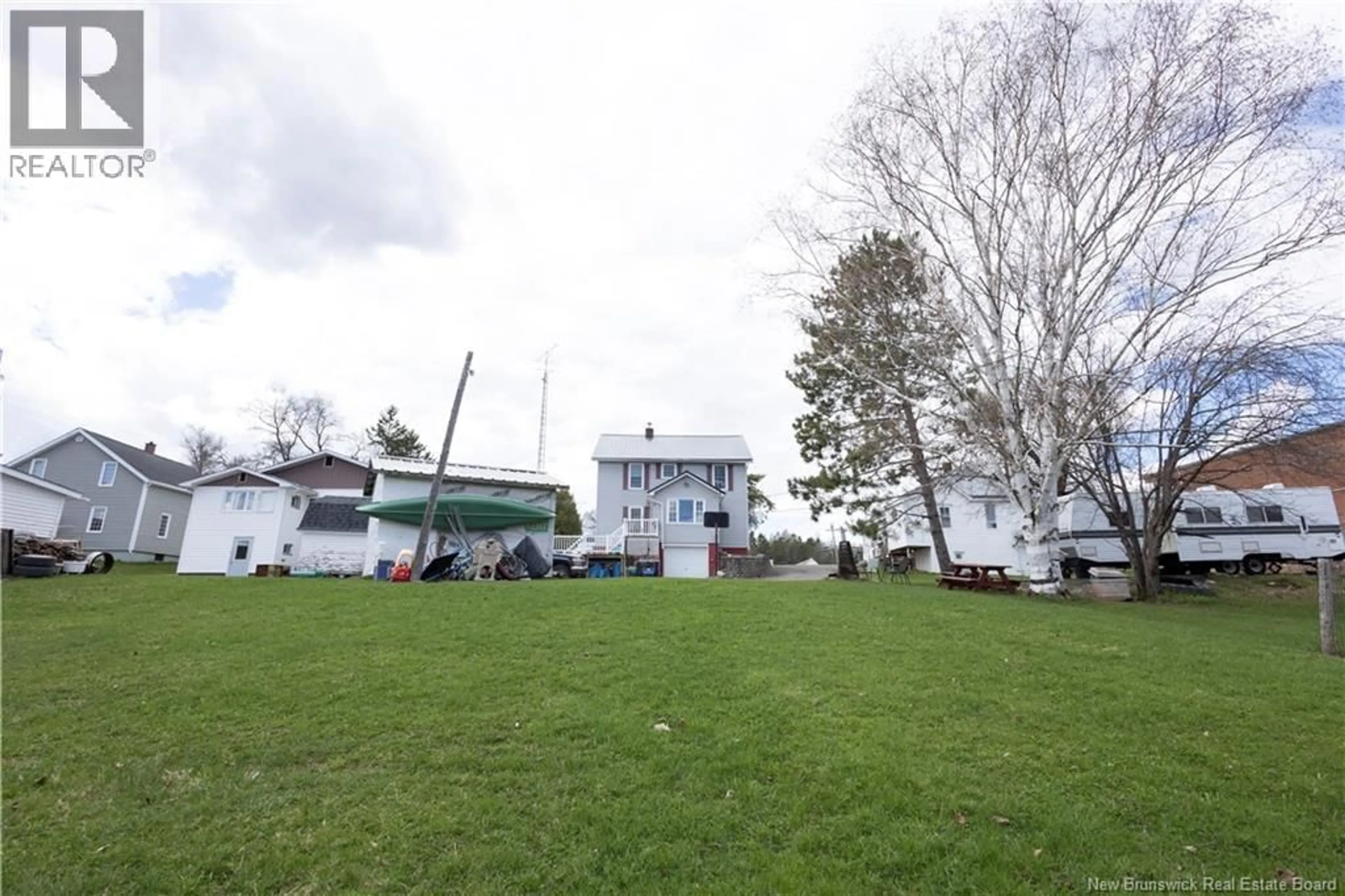 A pic from outside/outdoor area/front of a property/back of a property/a pic from drone, water/lake/river/ocean view for 90 BROOK STREET, Plaster Rock New Brunswick E7G1G1