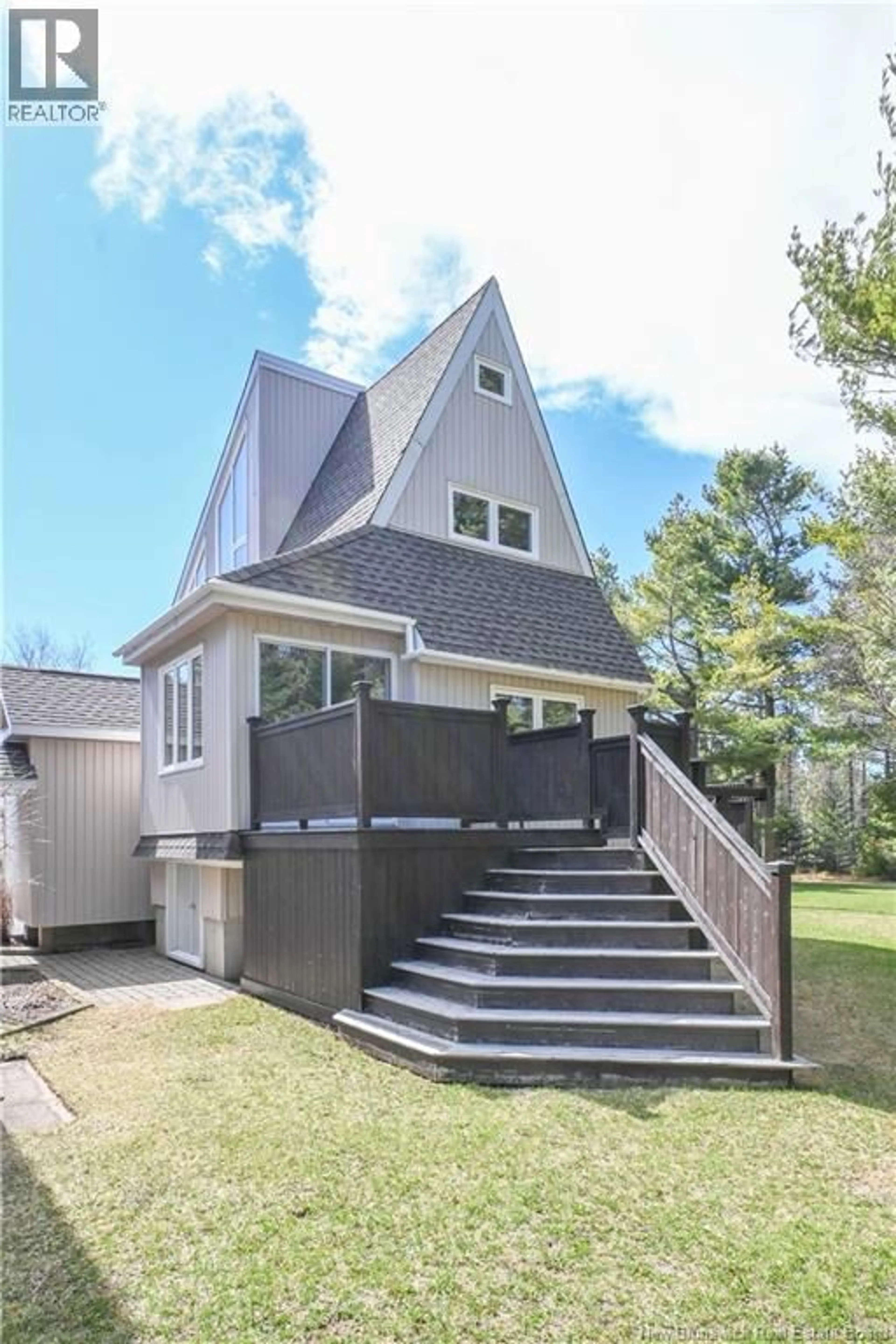 Home with vinyl exterior material, street for 14 CHALEUR STREET, Maisonnette New Brunswick E8N2K4