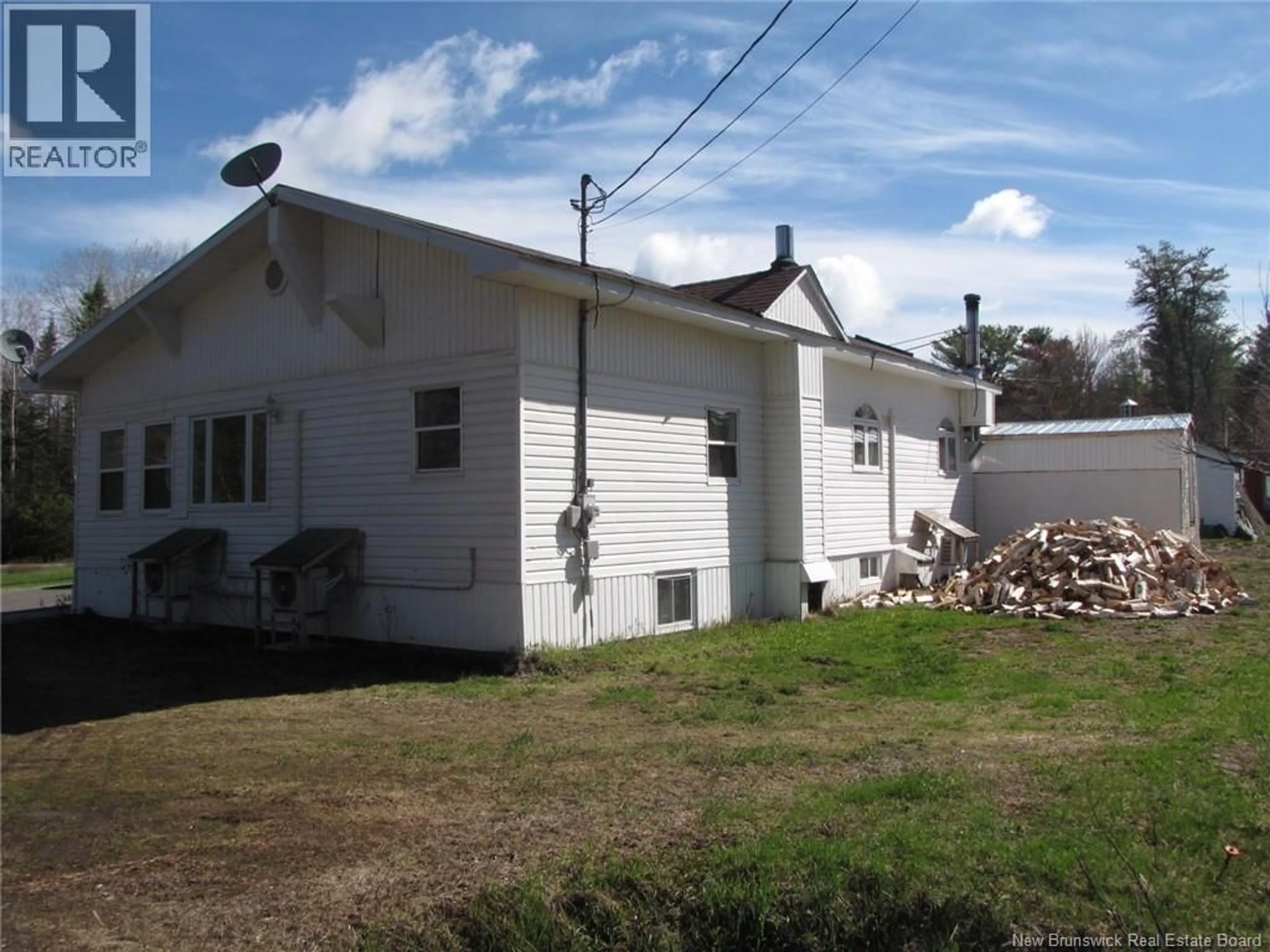 Home with vinyl exterior material, street for 7593 10 ROUTE, New Zion New Brunswick E4A2S2