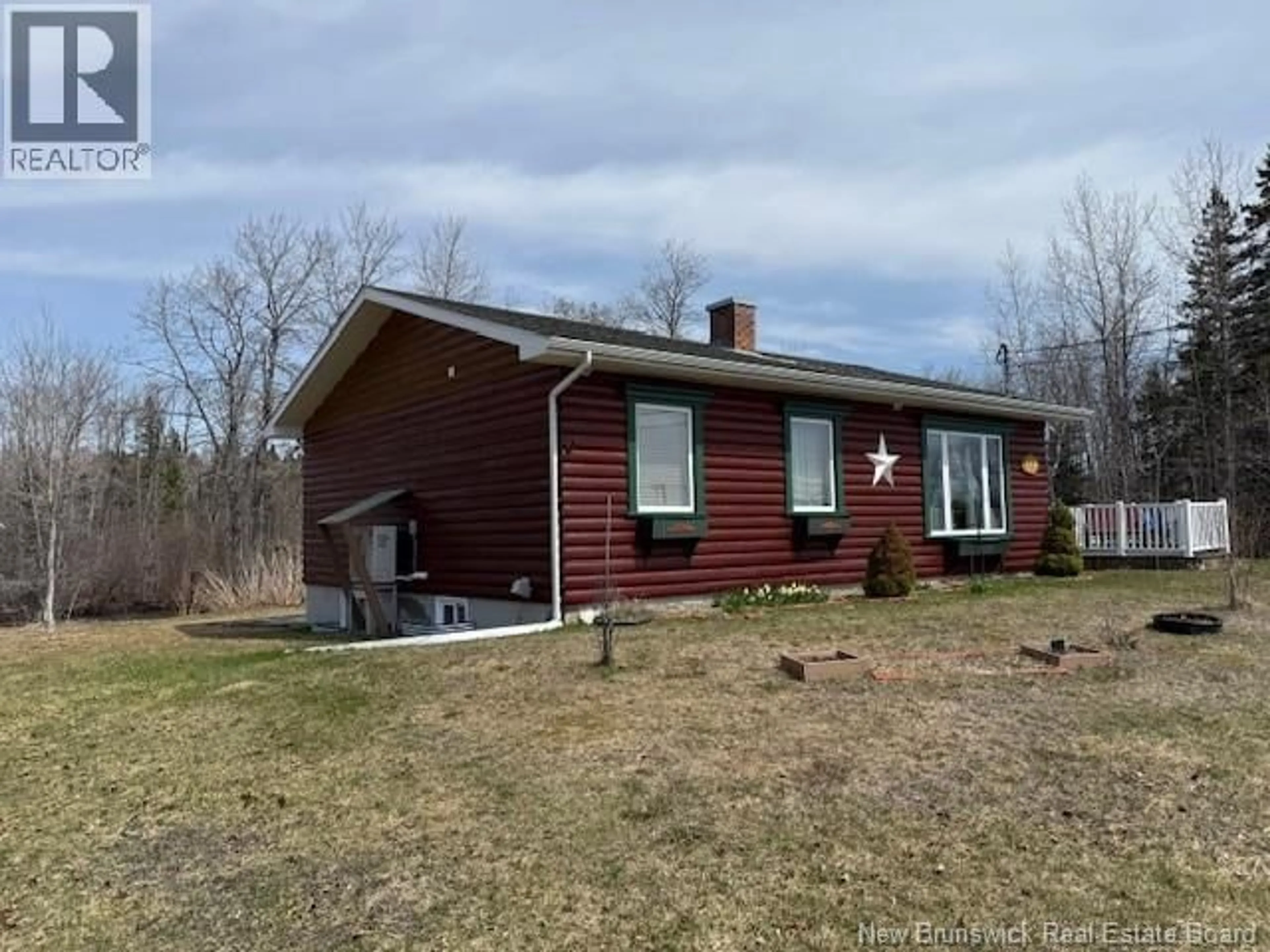 A pic from outside/outdoor area/front of a property/back of a property/a pic from drone, unknown for 110 ARSENAULT STREET, Eel River Crossing New Brunswick E8E1N8