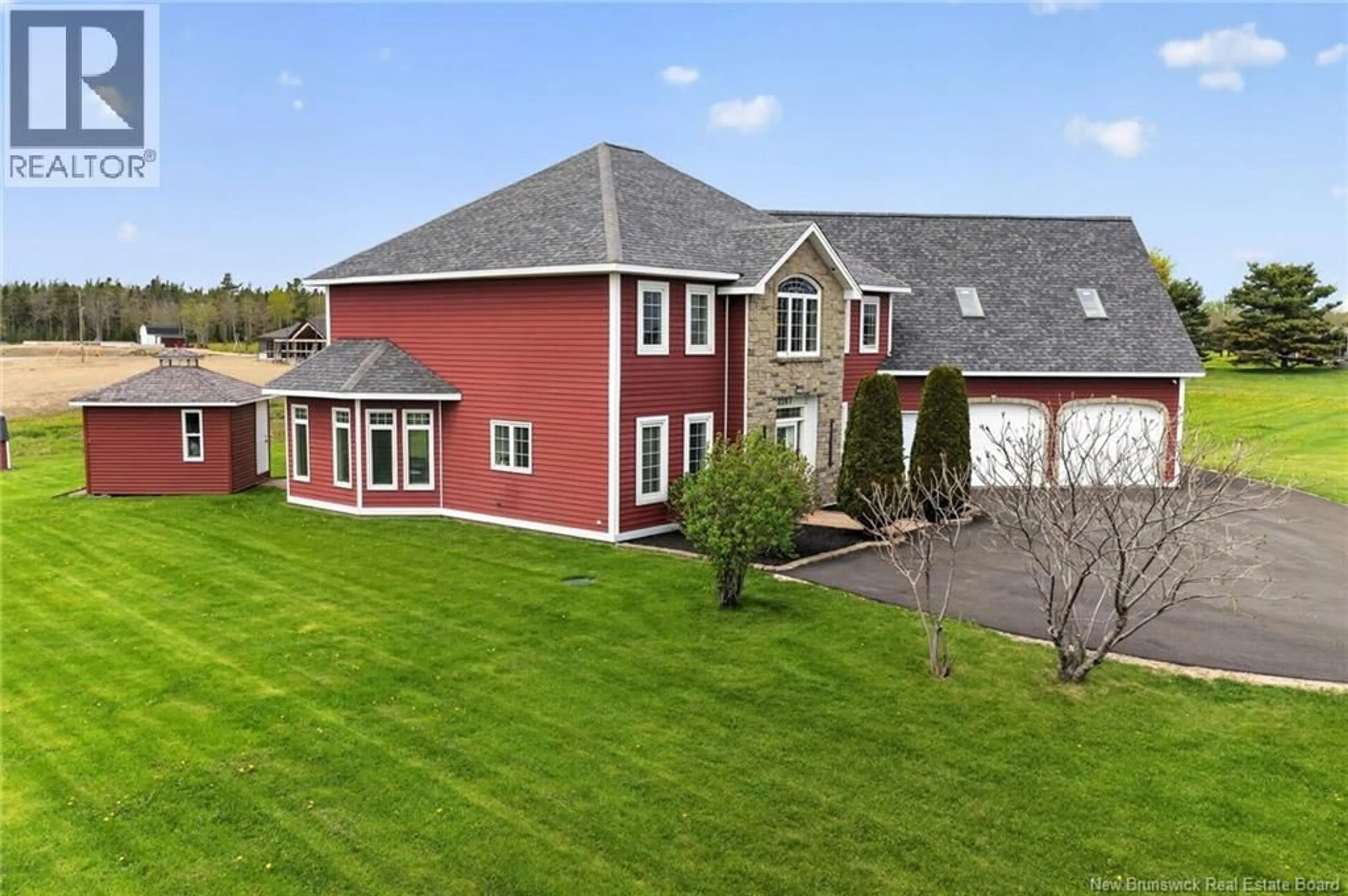 A pic from outside/outdoor area/front of a property/back of a property/a pic from drone, unknown for 2207 RTE 535 ROUTE, Cocagne New Brunswick E4V2M6
