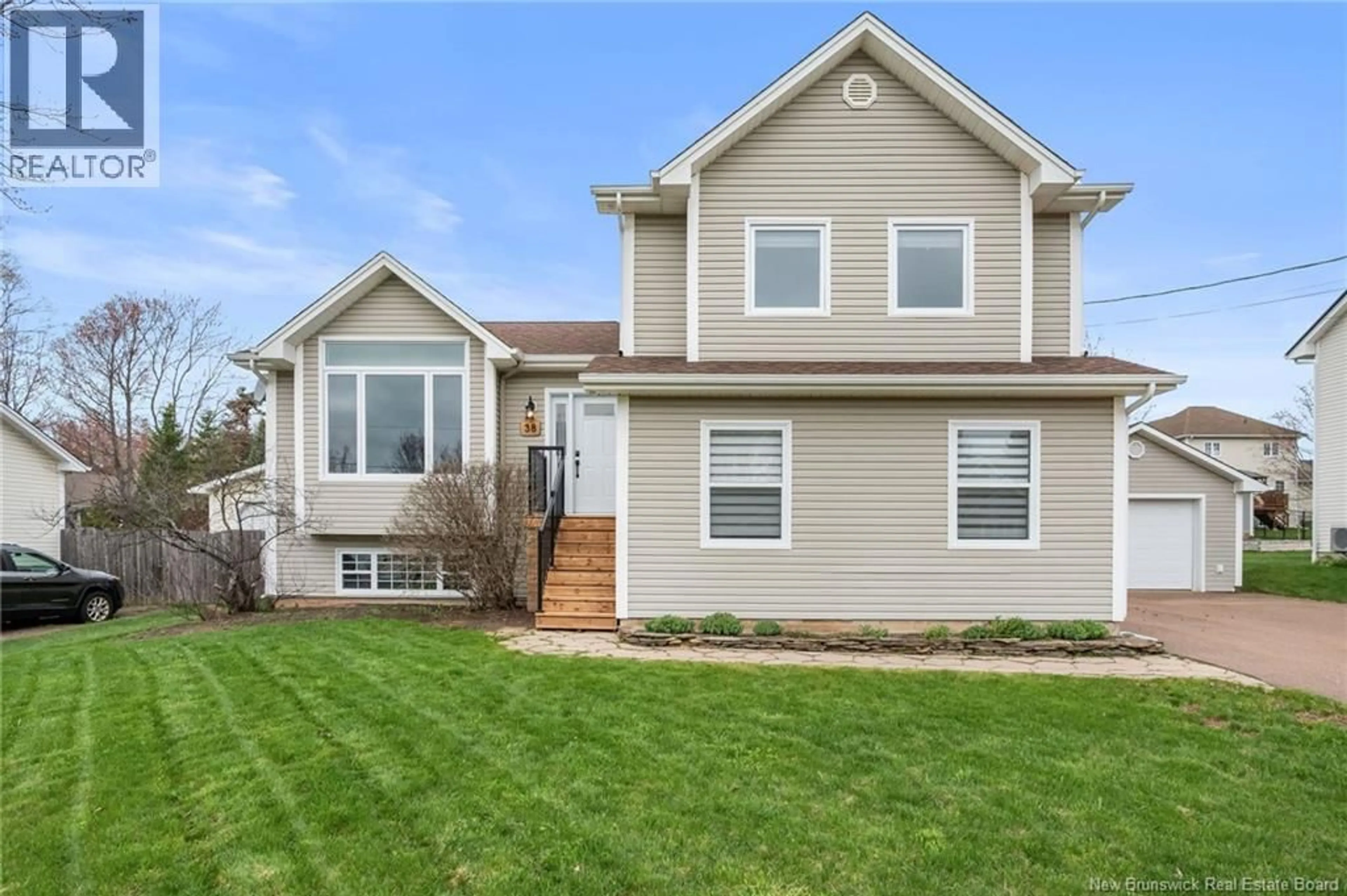 Home with vinyl exterior material, street for 38 LEGRESLEY STREET, Dieppe New Brunswick E1A8C9