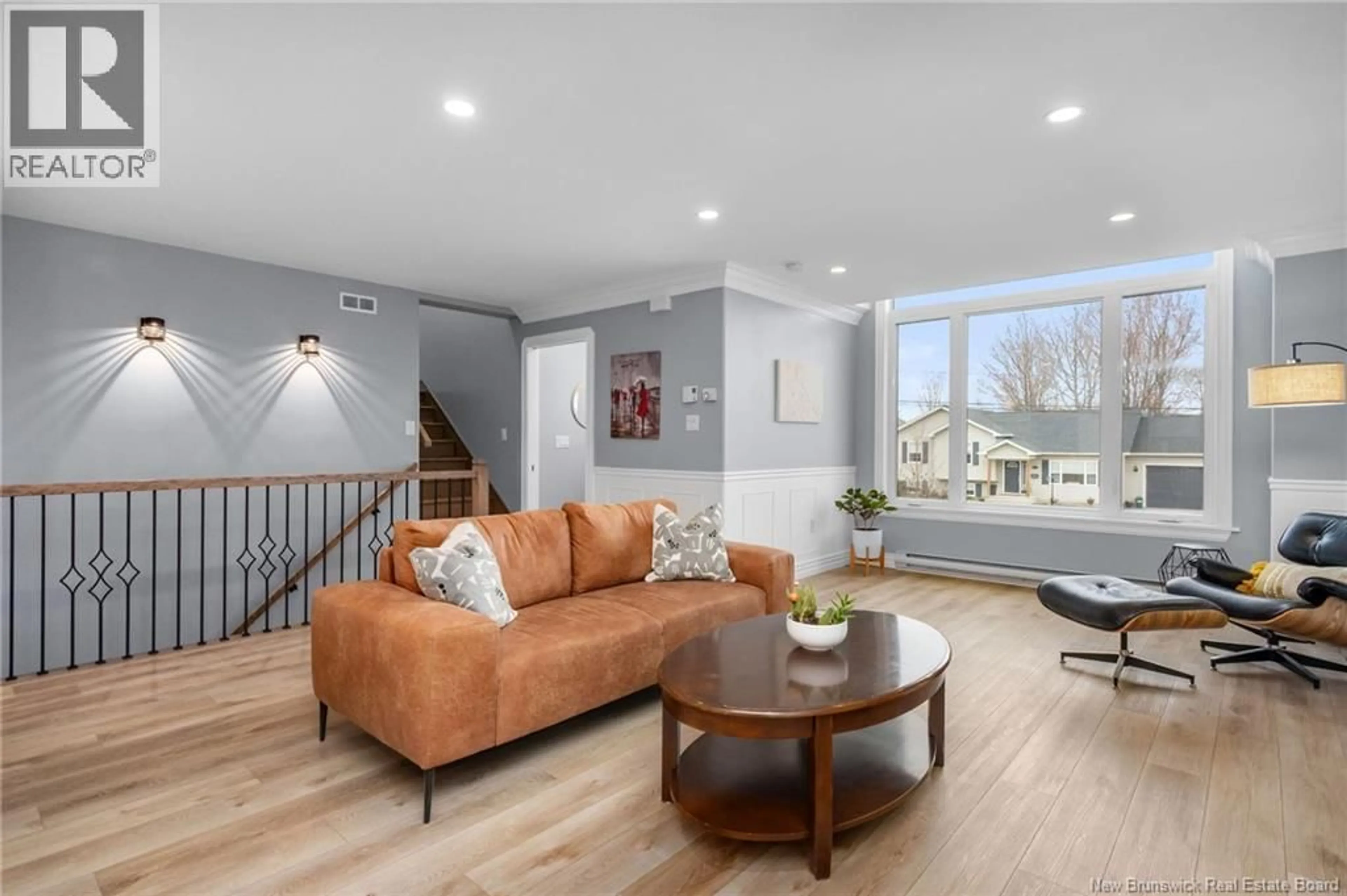Living room with furniture, wood/laminate floor for 38 LEGRESLEY STREET, Dieppe New Brunswick E1A8C9