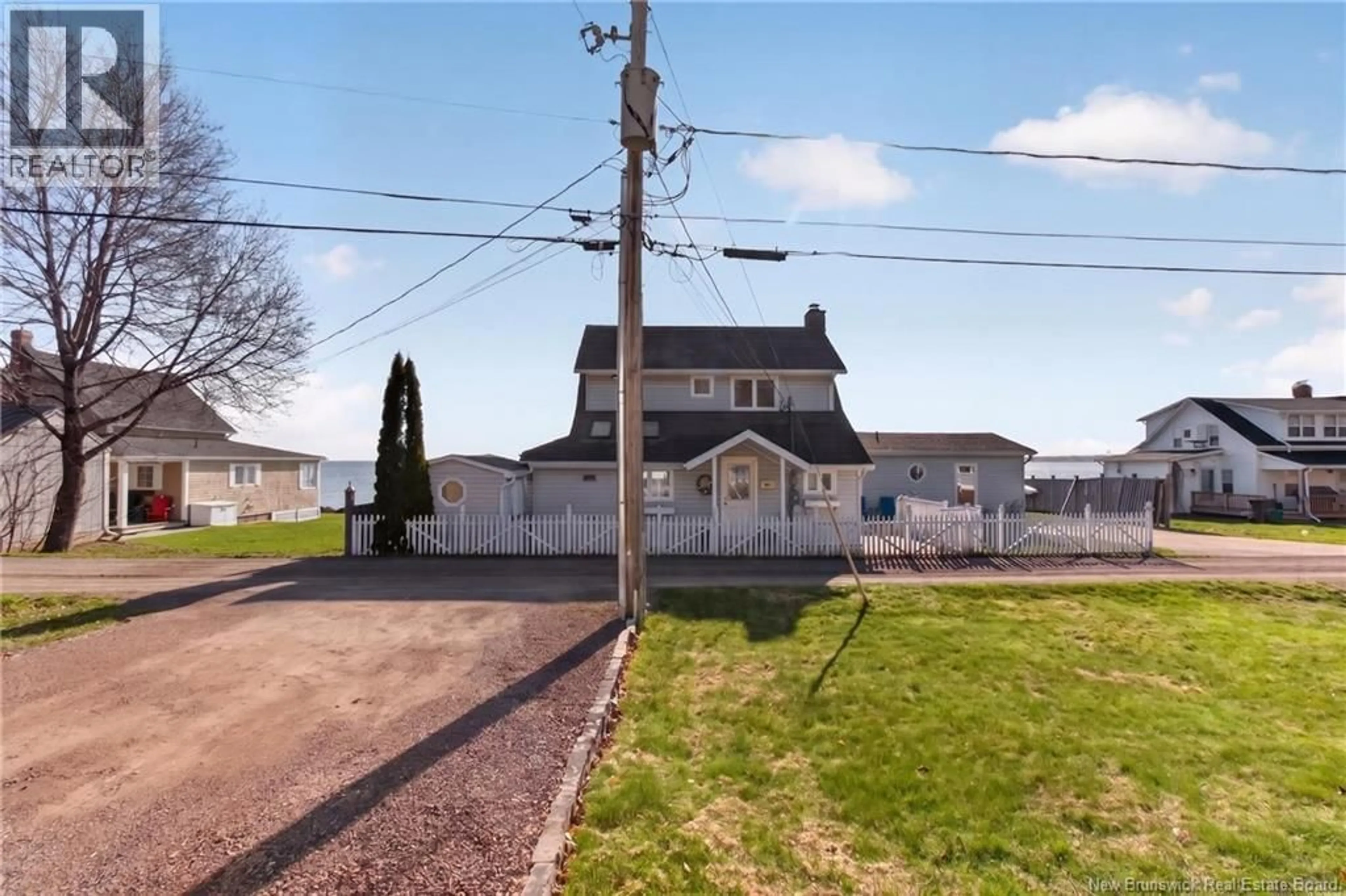 A pic from outside/outdoor area/front of a property/back of a property/a pic from drone, street for 10 BURDEN LANE, Shediac Cape New Brunswick E4P8S1