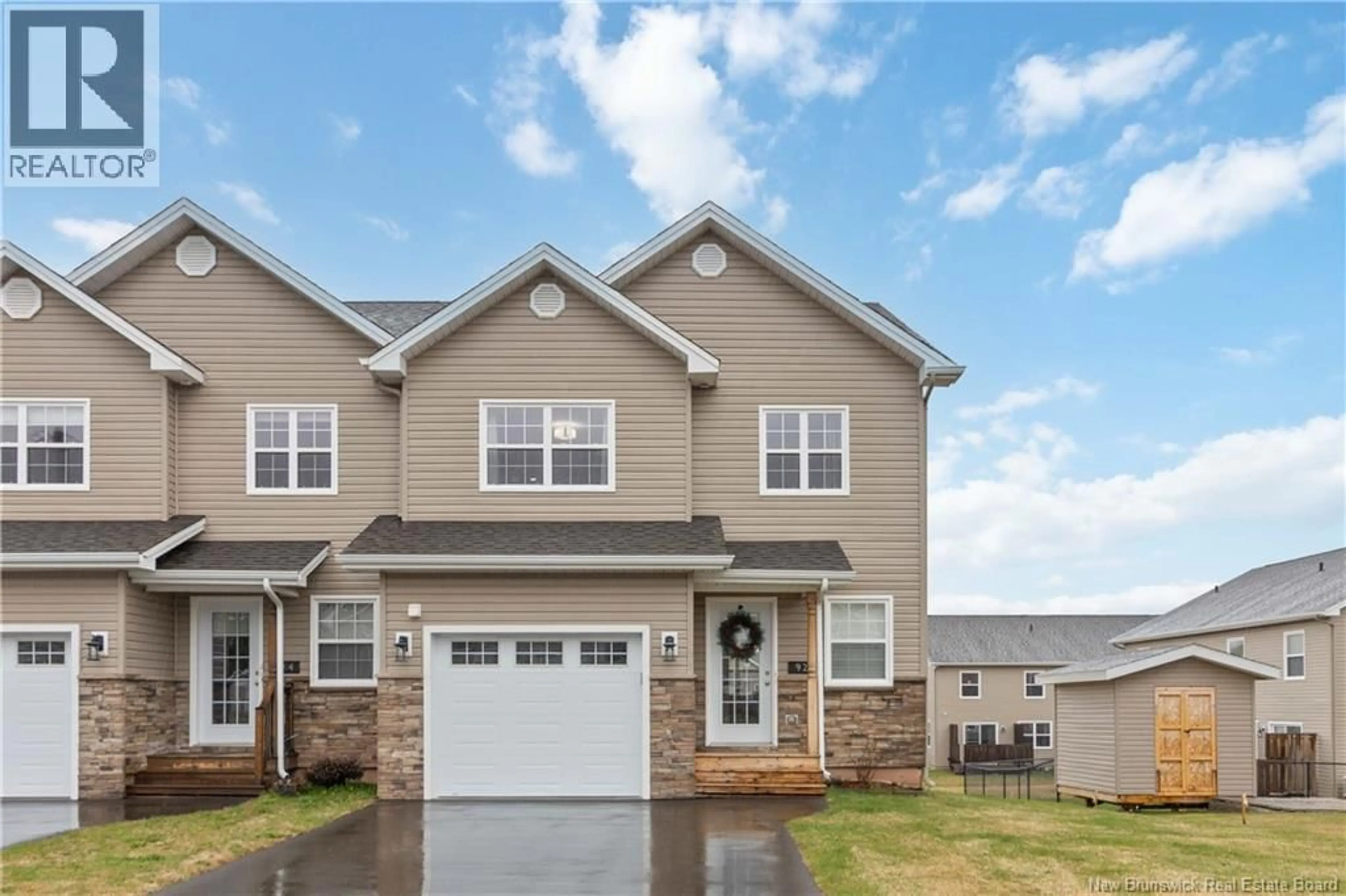 Home with vinyl exterior material, street for 92 BASTARACHE, Dieppe New Brunswick E1A6V6