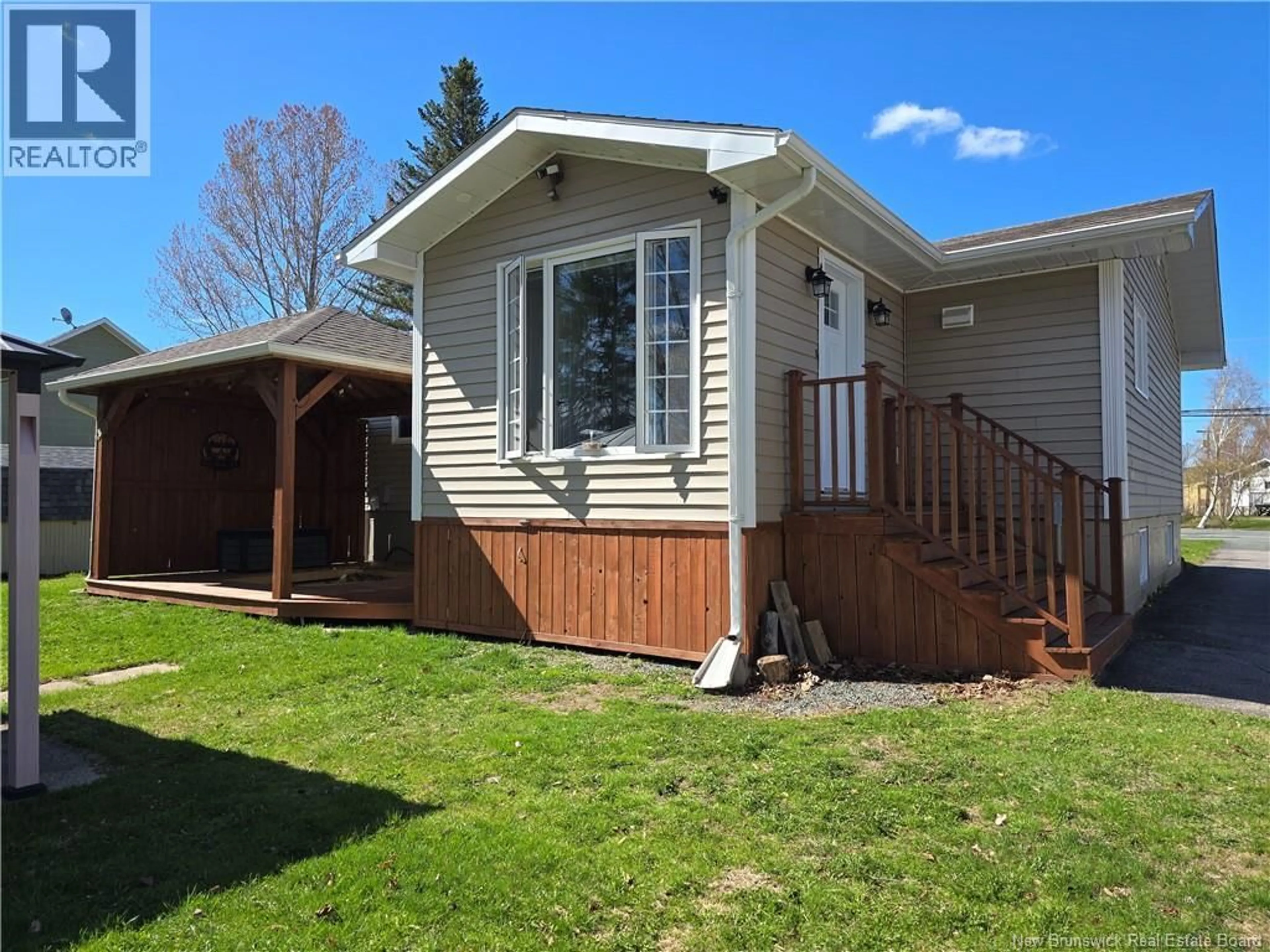 Home with vinyl exterior material, street for 429 ACADIE, Beresford New Brunswick E8K2C6