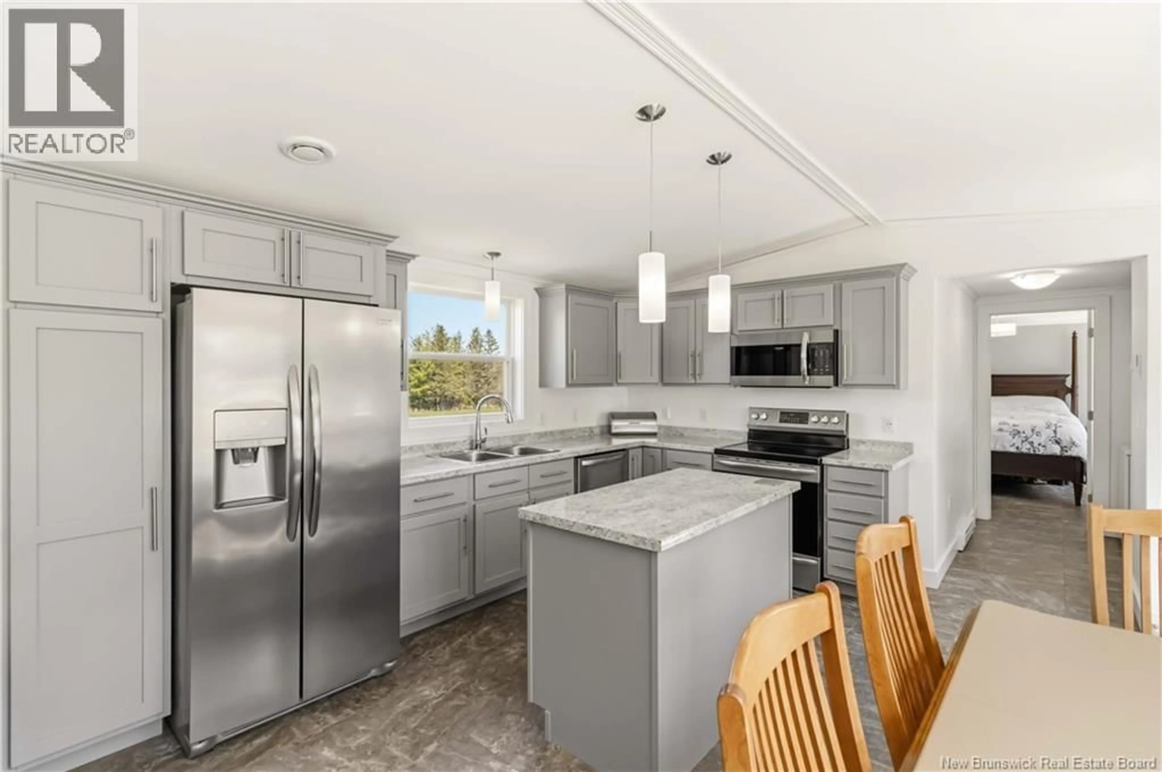 Open concept kitchen, ceramic/tile floor for 184 RIVERSIDE DRIVE, Fredericton Junction New Brunswick E5L1V9