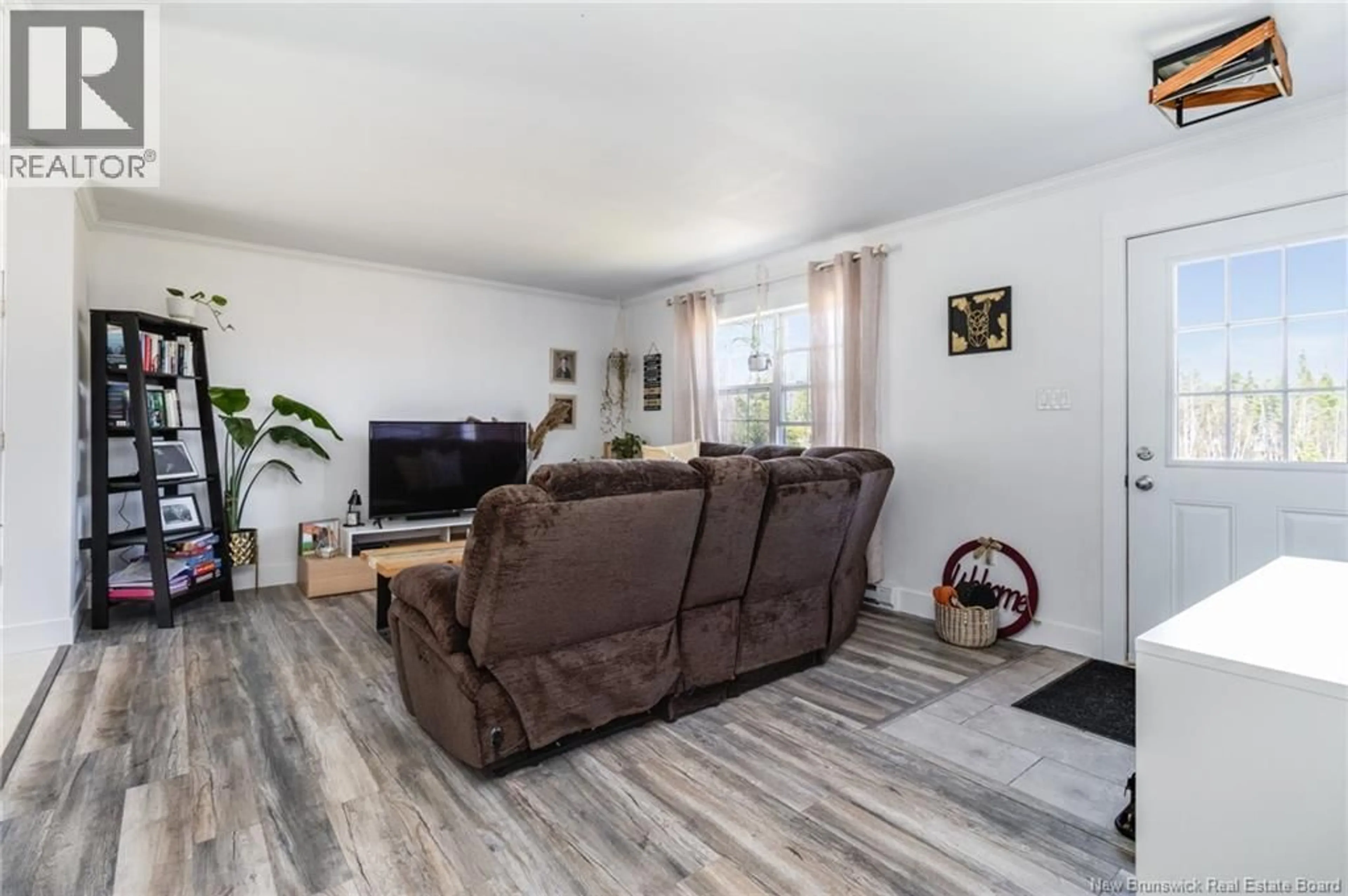 Living room with furniture, wood/laminate floor for 35 HONEYWOOD DRIVE, Waasis New Brunswick E3B8Z9
