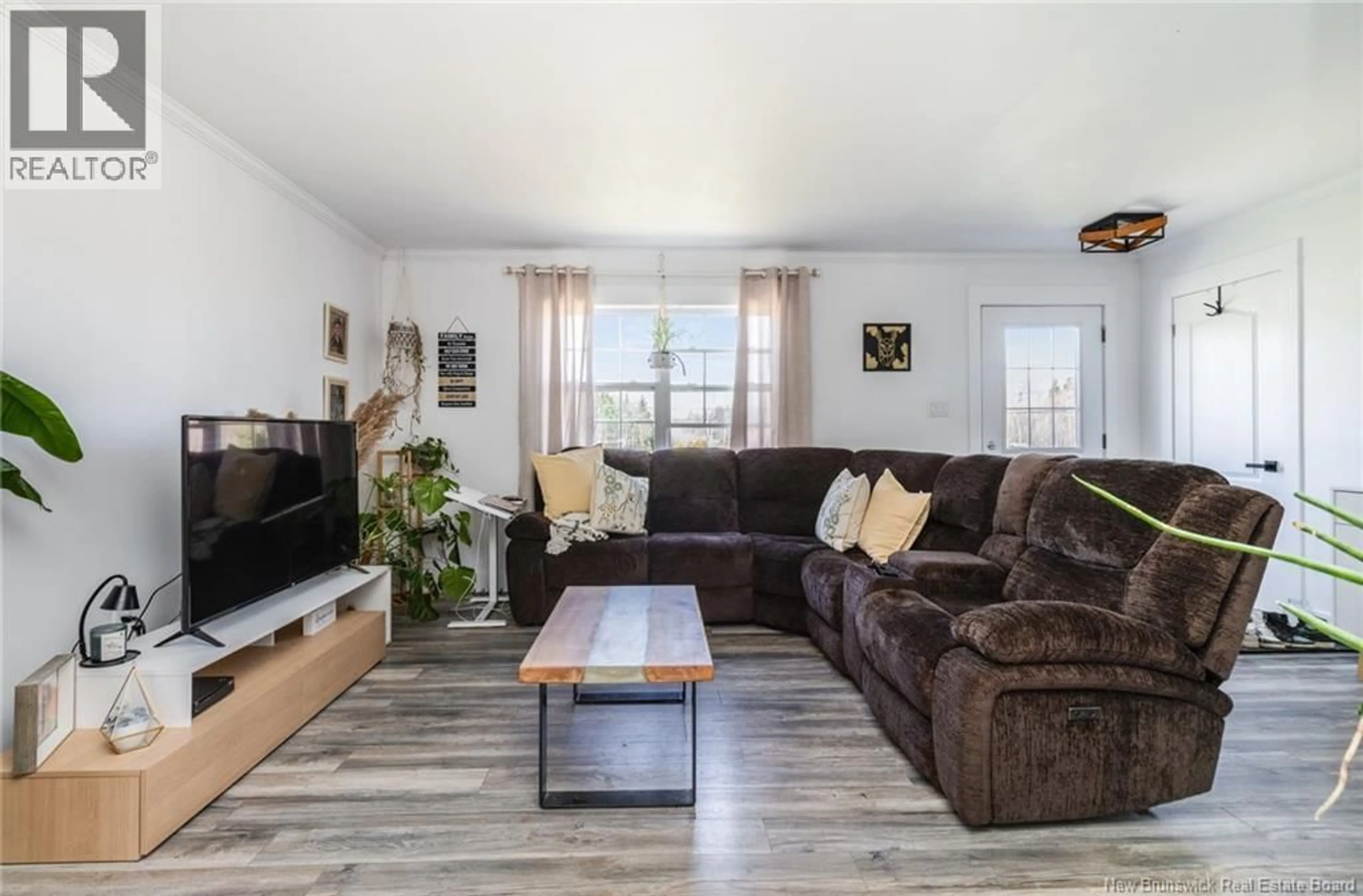 Living room with furniture, wood/laminate floor for 35 HONEYWOOD DRIVE, Waasis New Brunswick E3B8Z9