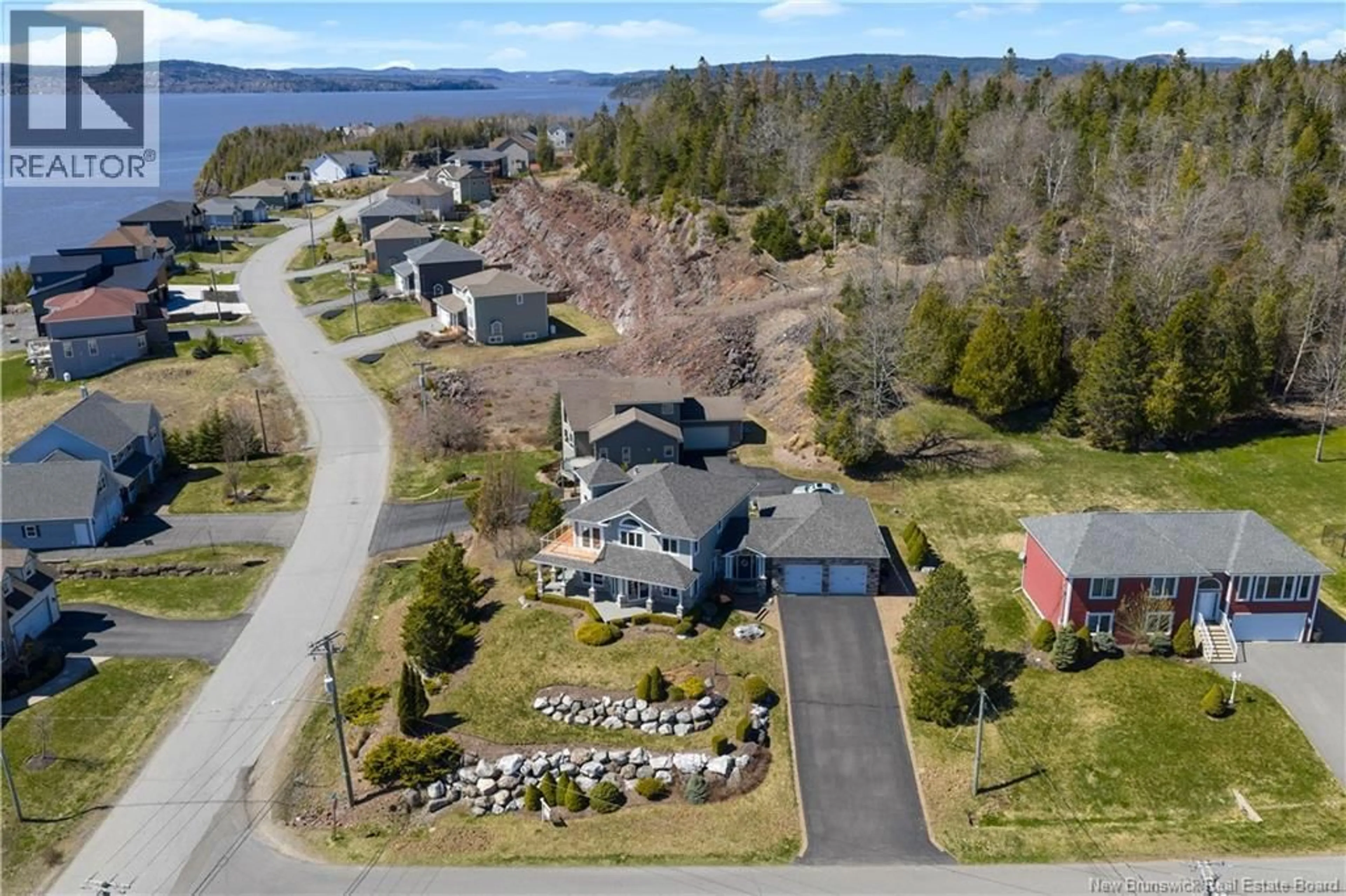 A pic from outside/outdoor area/front of a property/back of a property/a pic from drone, water/lake/river/ocean view for 5 ADMIRALTY DRIVE, Saint John New Brunswick E2K5R4