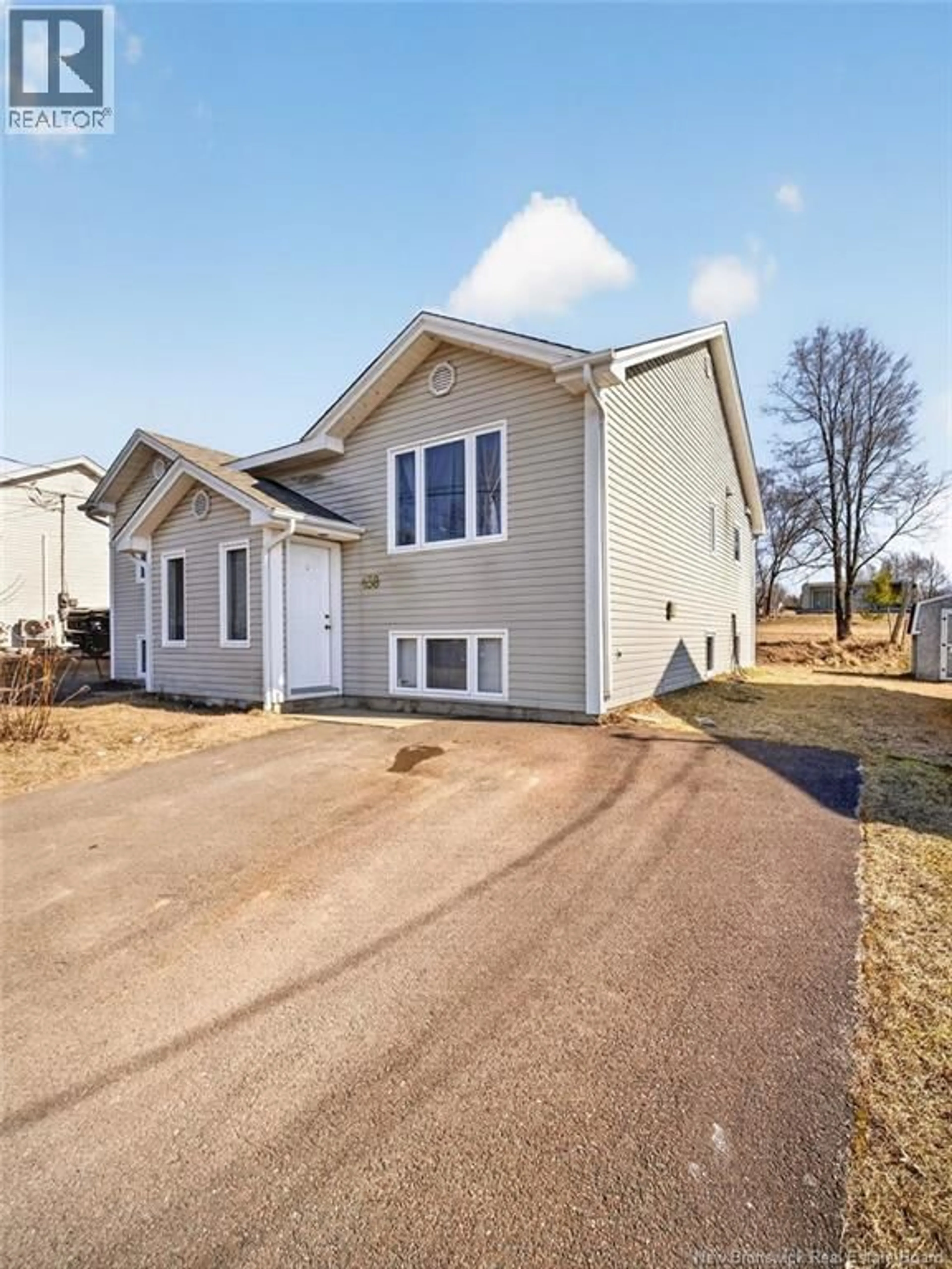 Home with vinyl exterior material, street for 436-438 LOUIS STREET, Dieppe New Brunswick E1A6X7