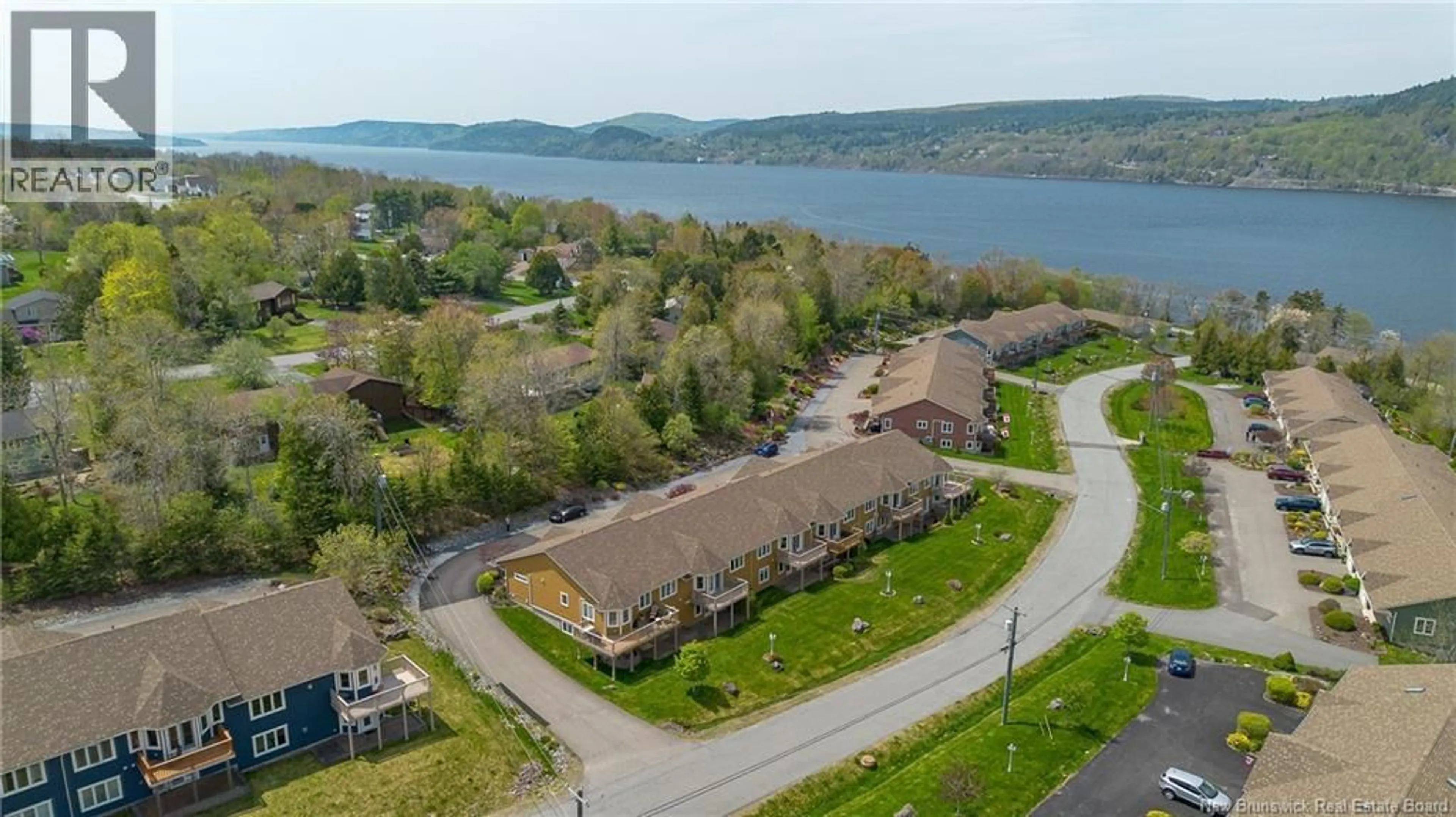 A pic from outside/outdoor area/front of a property/back of a property/a pic from drone, water/lake/river/ocean view for 38 MERRITT HILL ROAD, Quispamsis New Brunswick E2E6A1