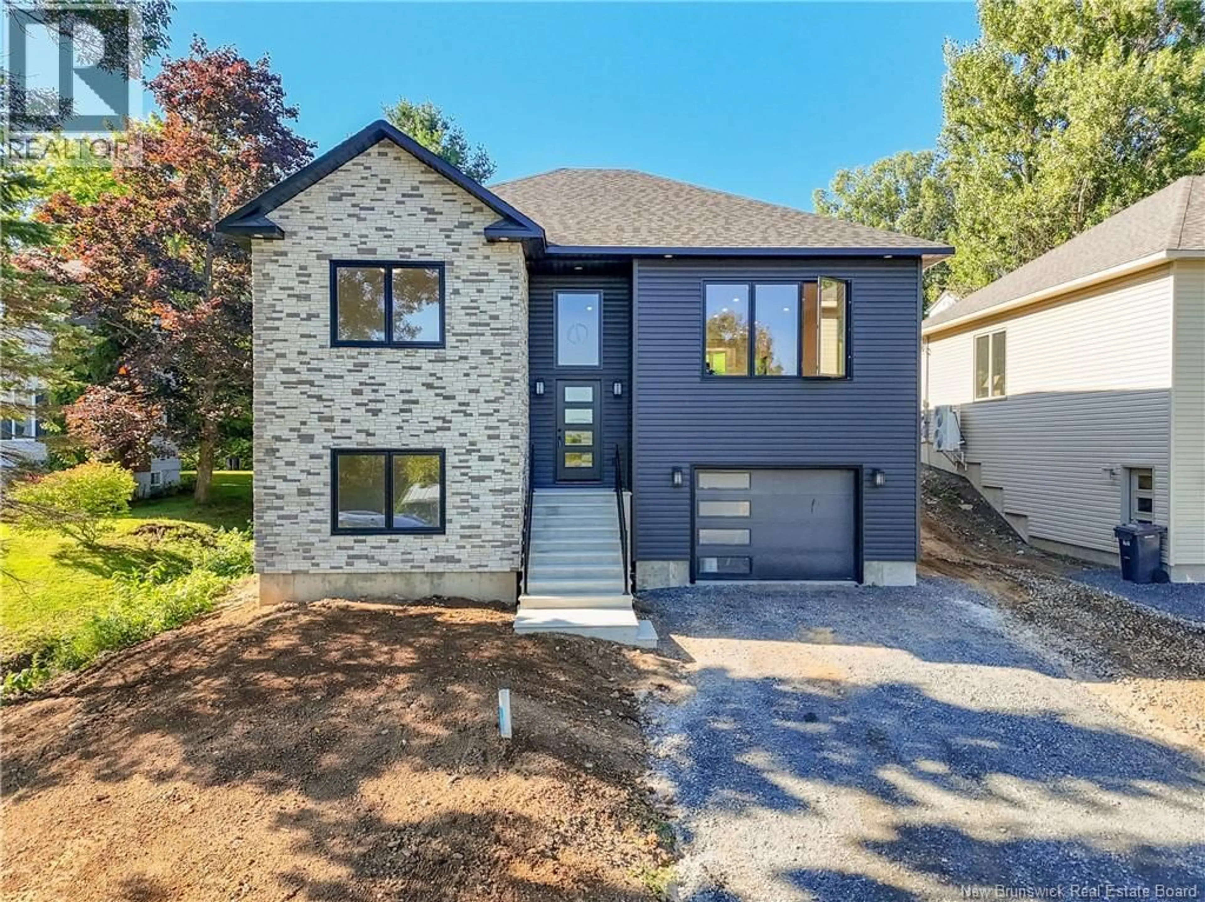 Home with brick exterior material, street for 16 MAYFLOWER STREET, Fredericton New Brunswick E3C1L5