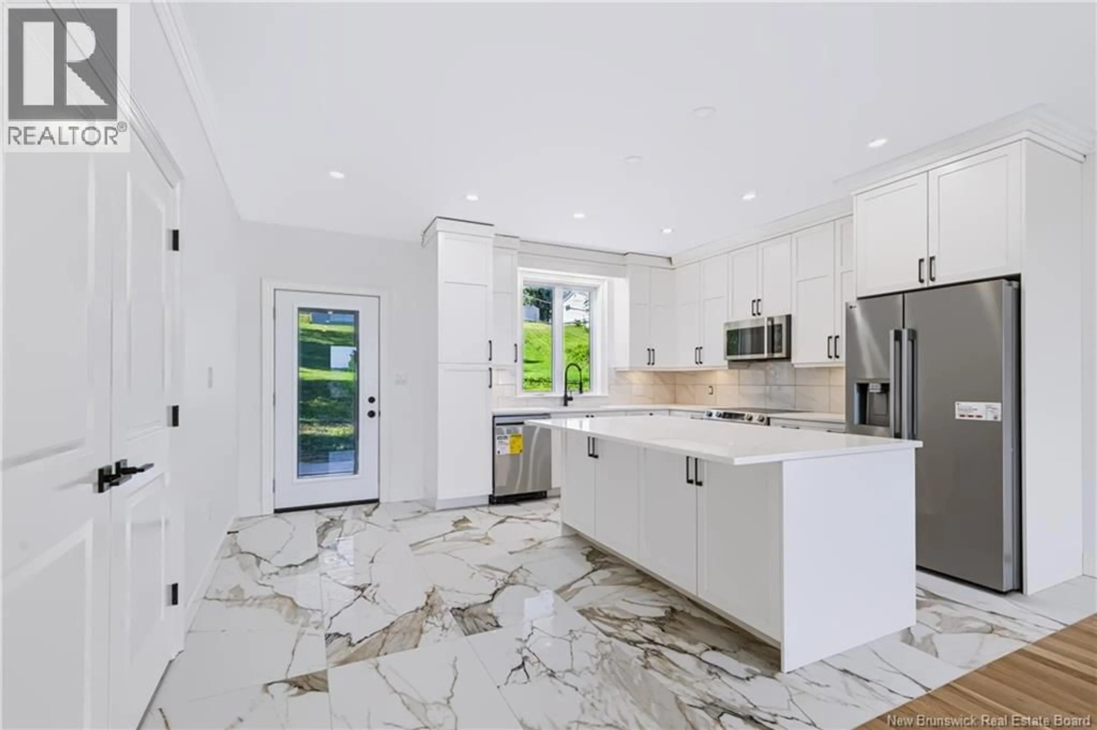 Open concept kitchen, ceramic/tile floor for 16 MAYFLOWER STREET, Fredericton New Brunswick E3C1L5