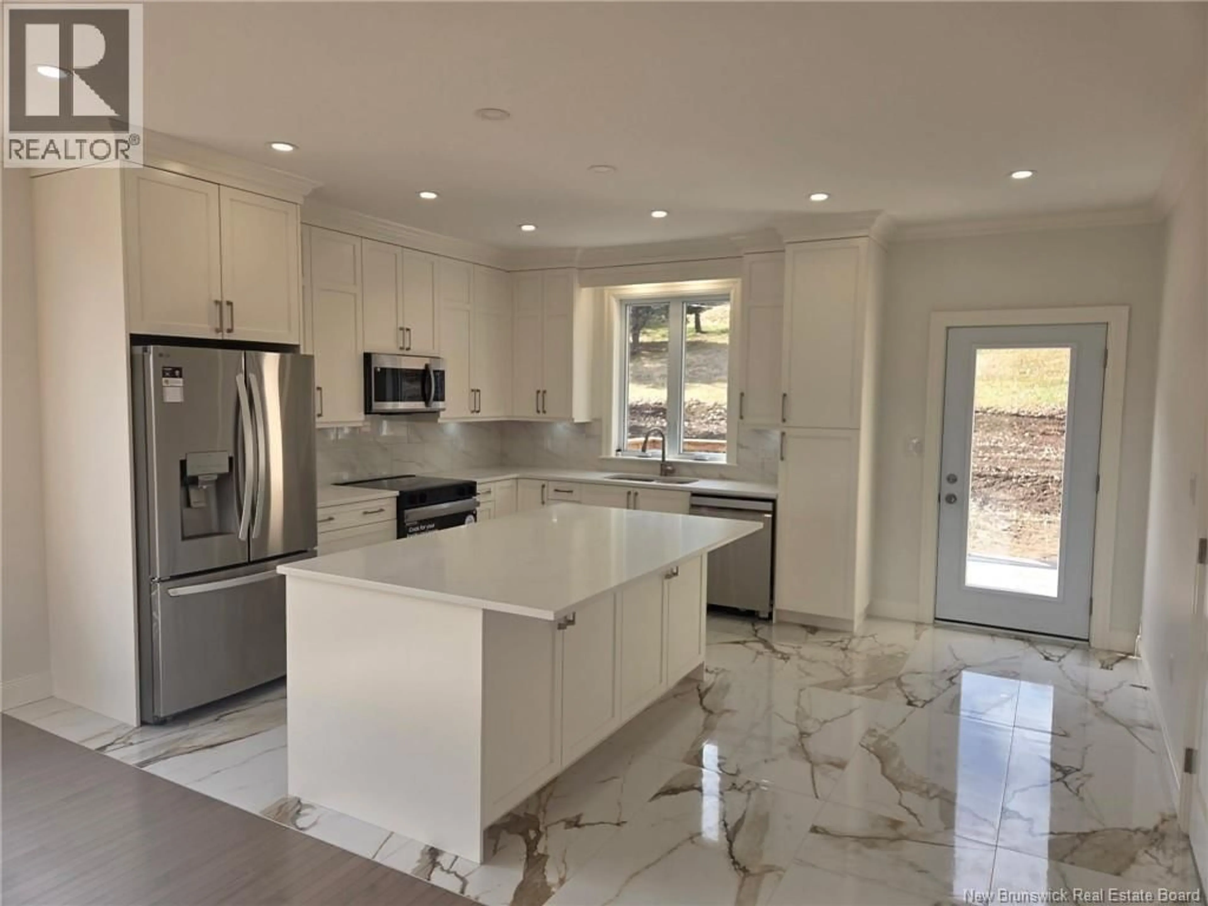 Open concept kitchen, ceramic/tile floor for 16 MAYFLOWER STREET, Fredericton New Brunswick E3C1L5