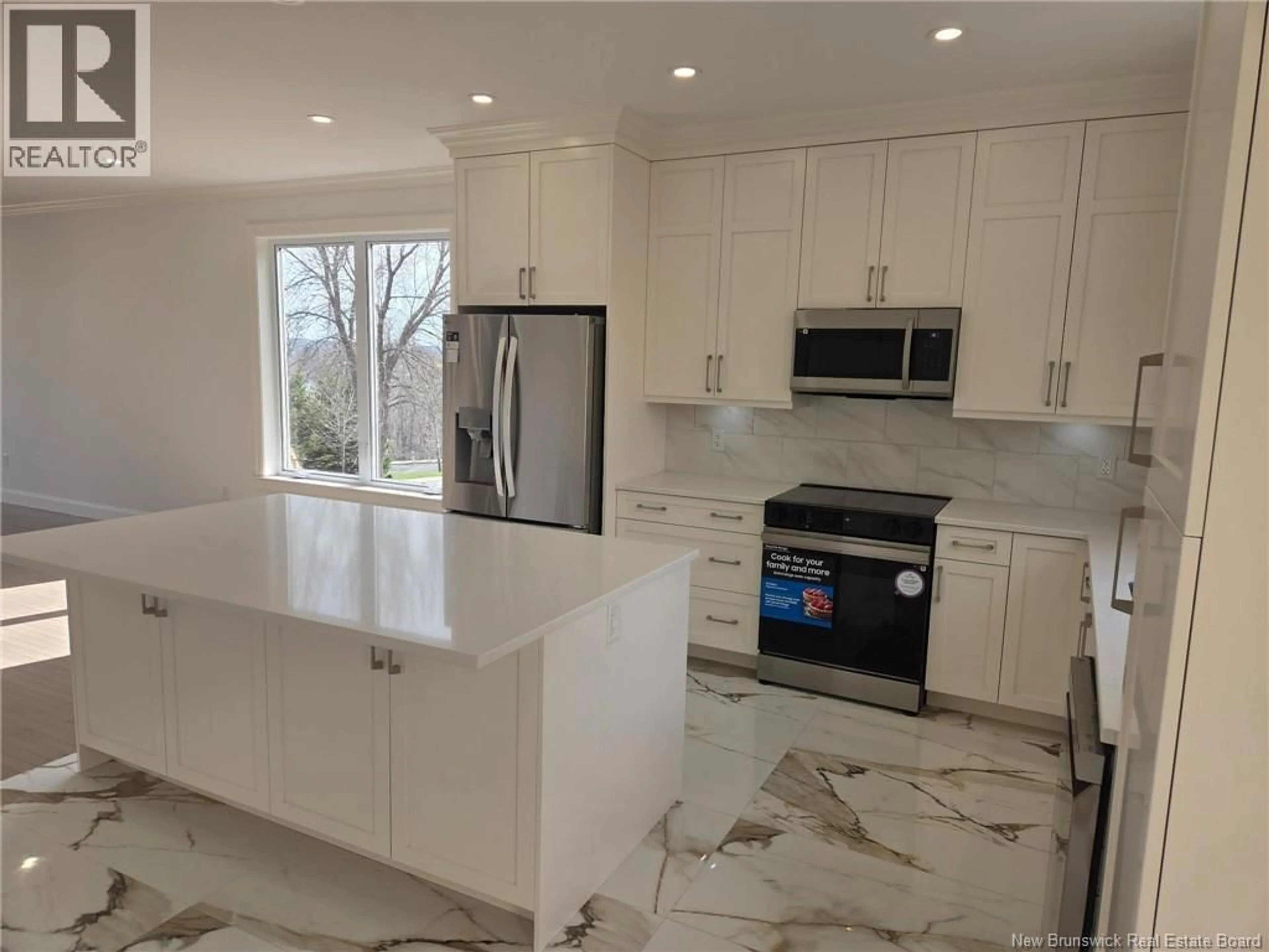 Open concept kitchen, ceramic/tile floor for 16 MAYFLOWER STREET, Fredericton New Brunswick E3C1L5