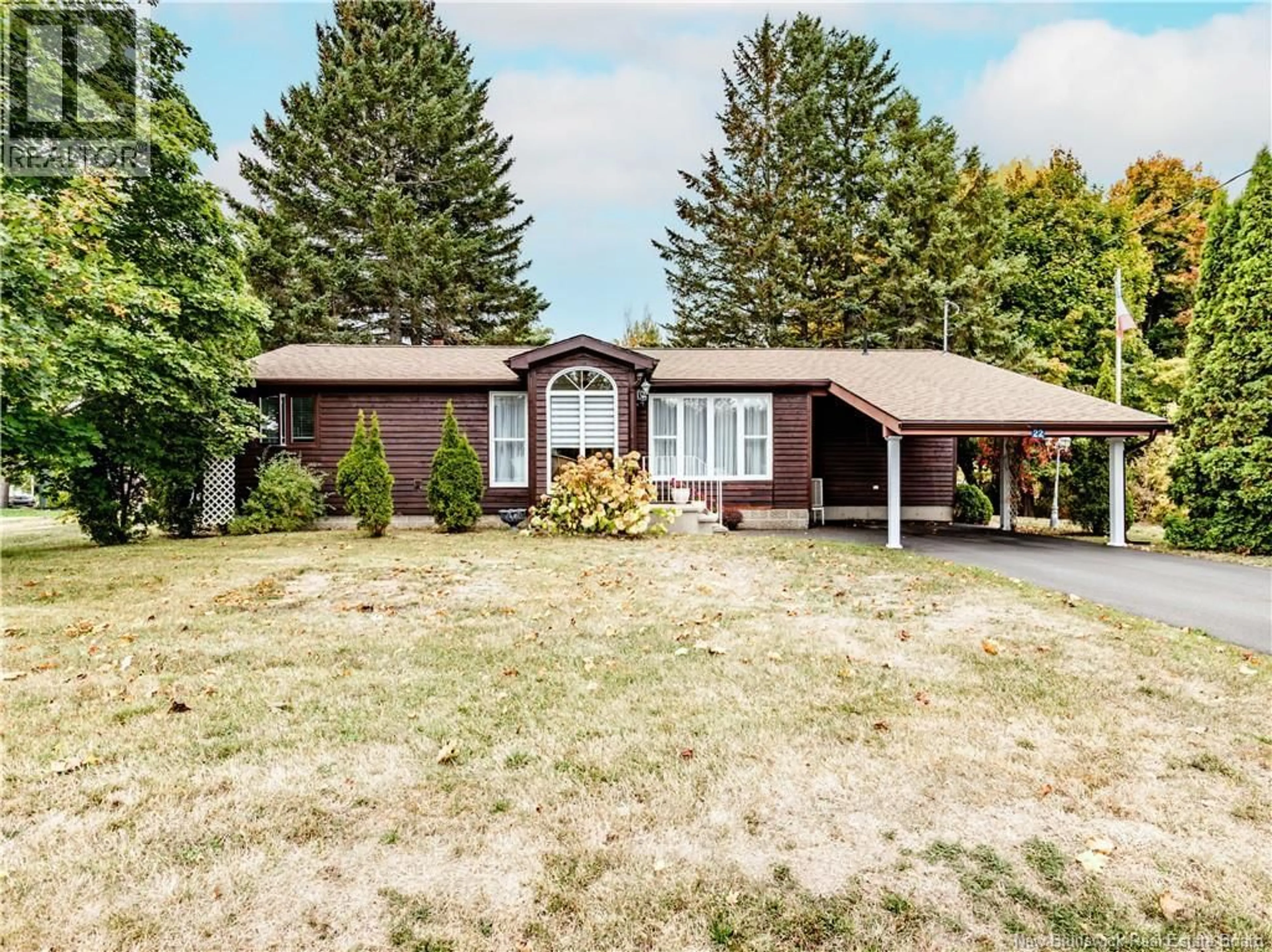 Home with vinyl exterior material, street for 22 RUE BEAUSEJOUR STREET, Saint-Louis-De-Kent New Brunswick E4X1A8