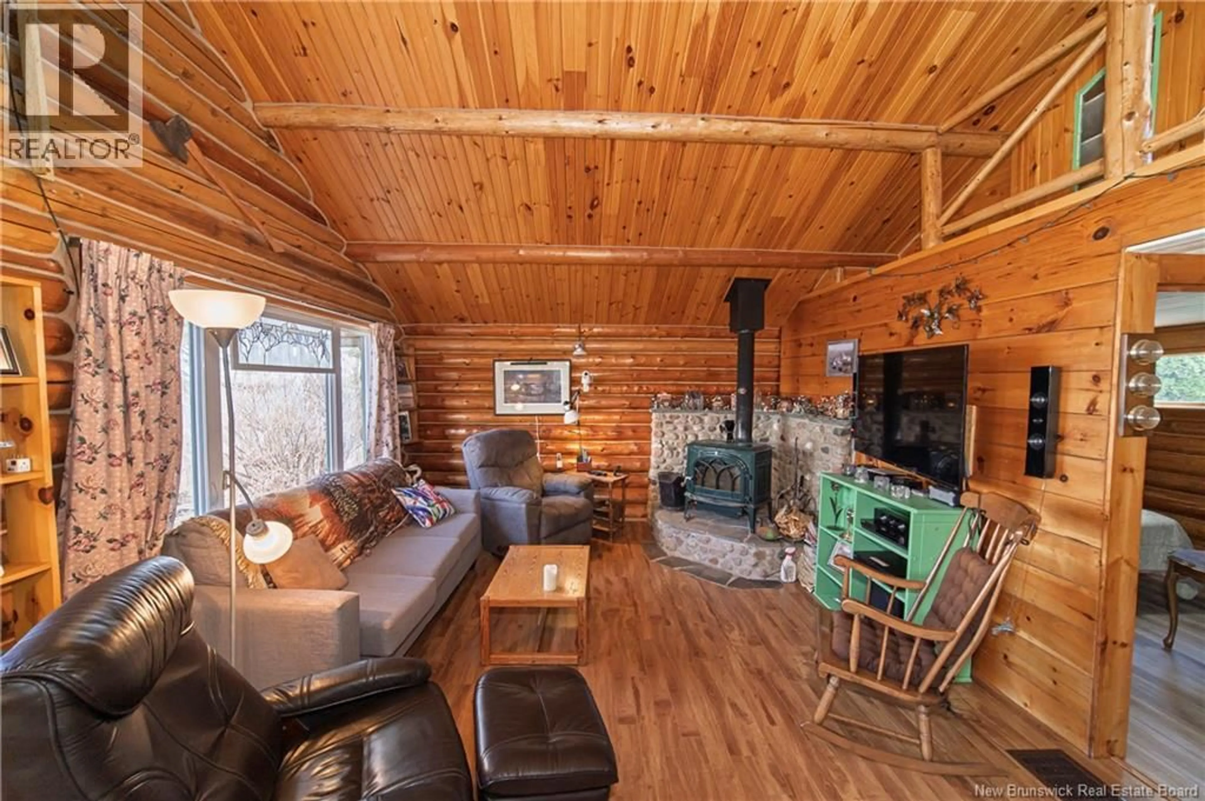 Living room with furniture, wood/laminate floor for 93 HAZEN LANE, Lake George New Brunswick E6K2N9