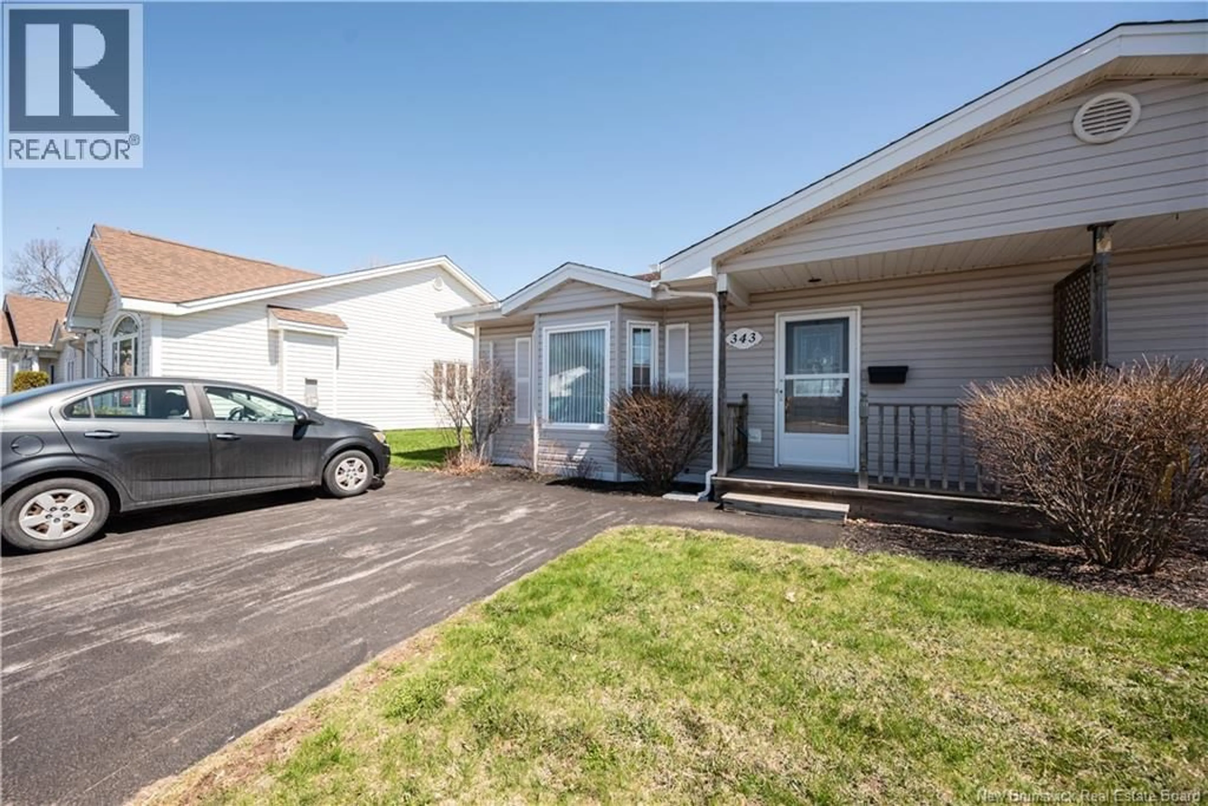 Home with vinyl exterior material, street for 343 BEAUSEJOUR STREET, Dieppe New Brunswick E1A1Y5