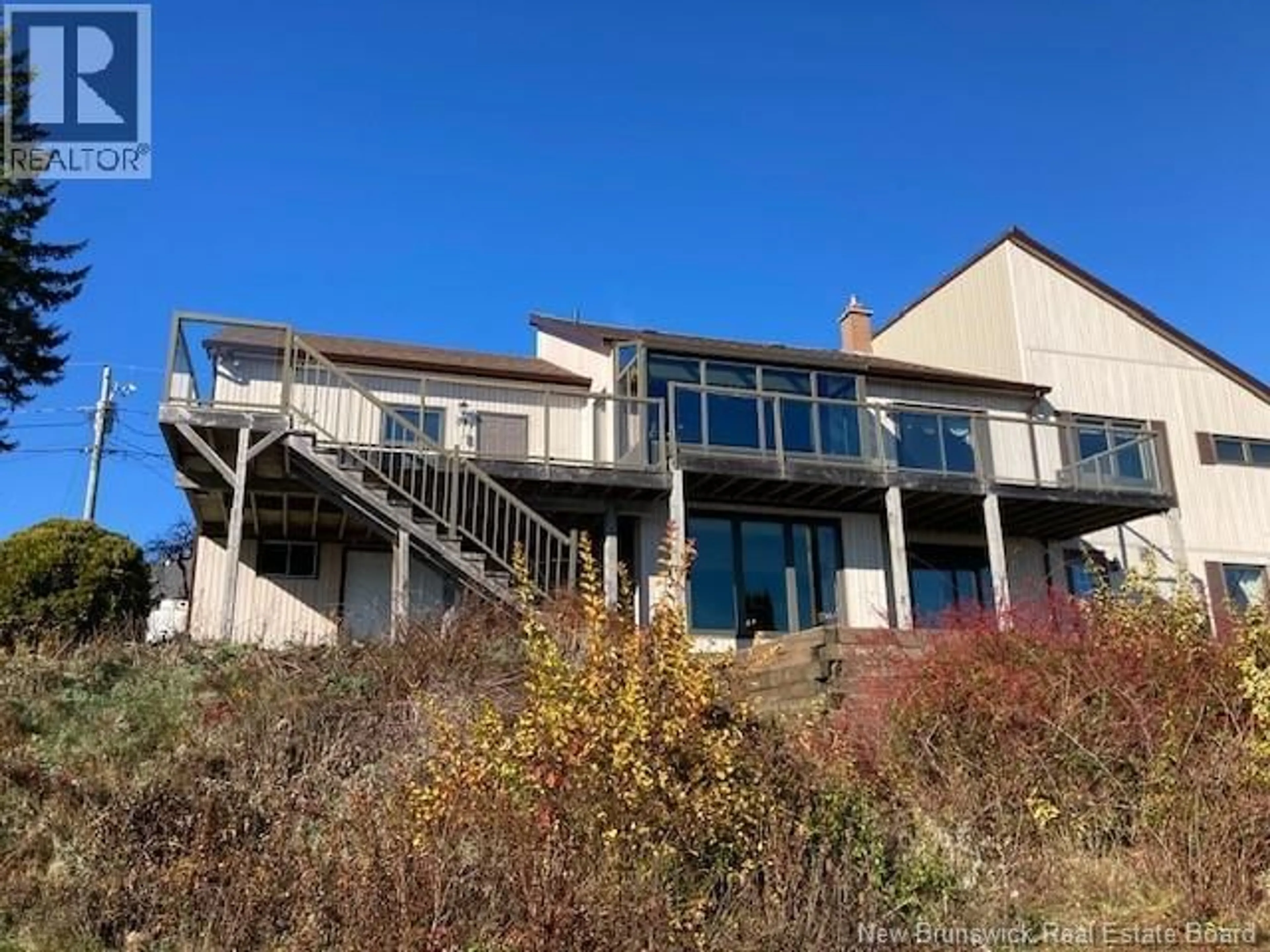 A pic from outside/outdoor area/front of a property/back of a property/a pic from drone, unknown for 10 BAYSONG BLUFF, Grand Bay-Westfield New Brunswick E5K2V2