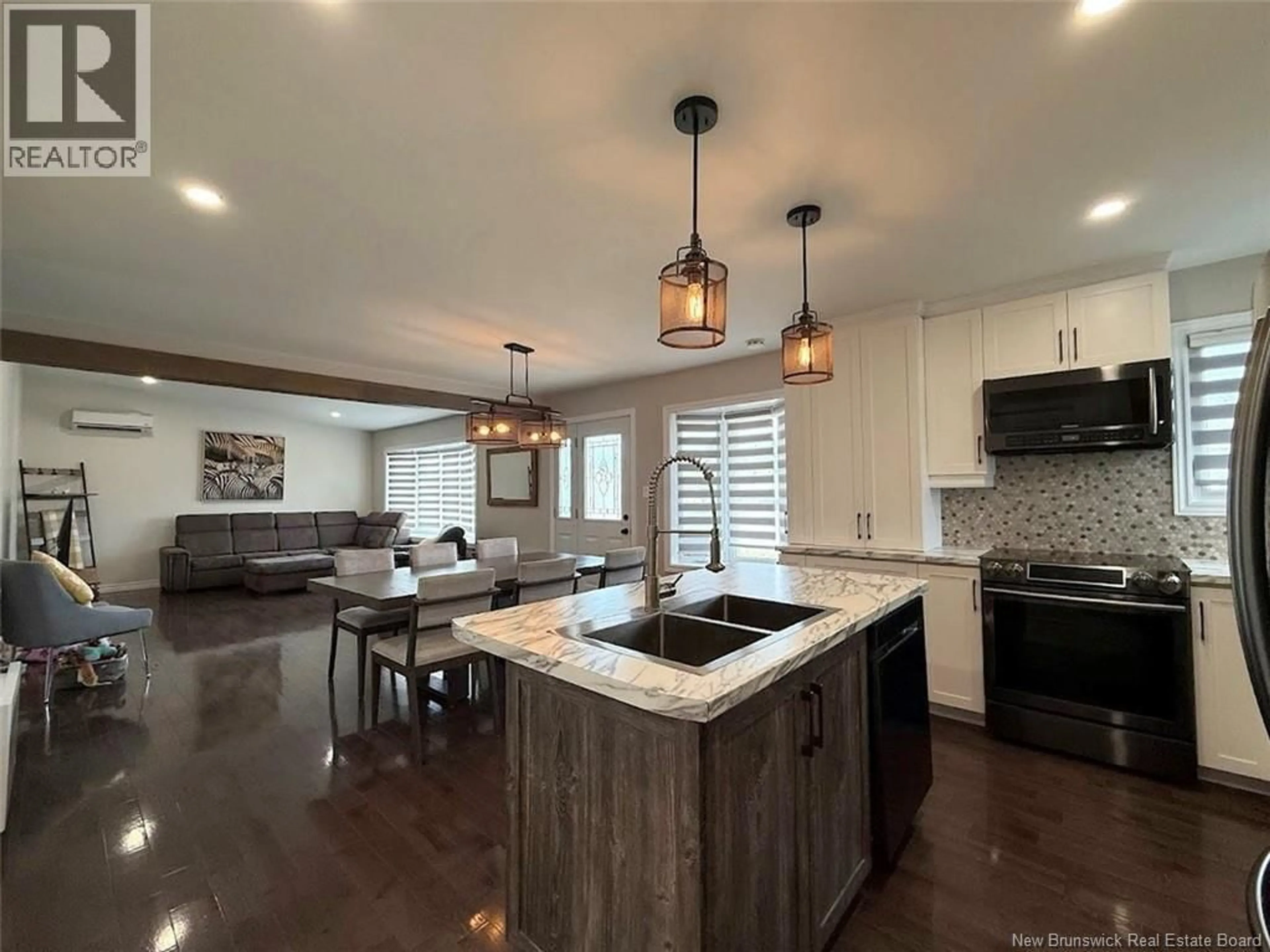 Open concept kitchen, ceramic/tile floor for 3 MOREAU STREET, Rivière-Verte New Brunswick E7C2S8