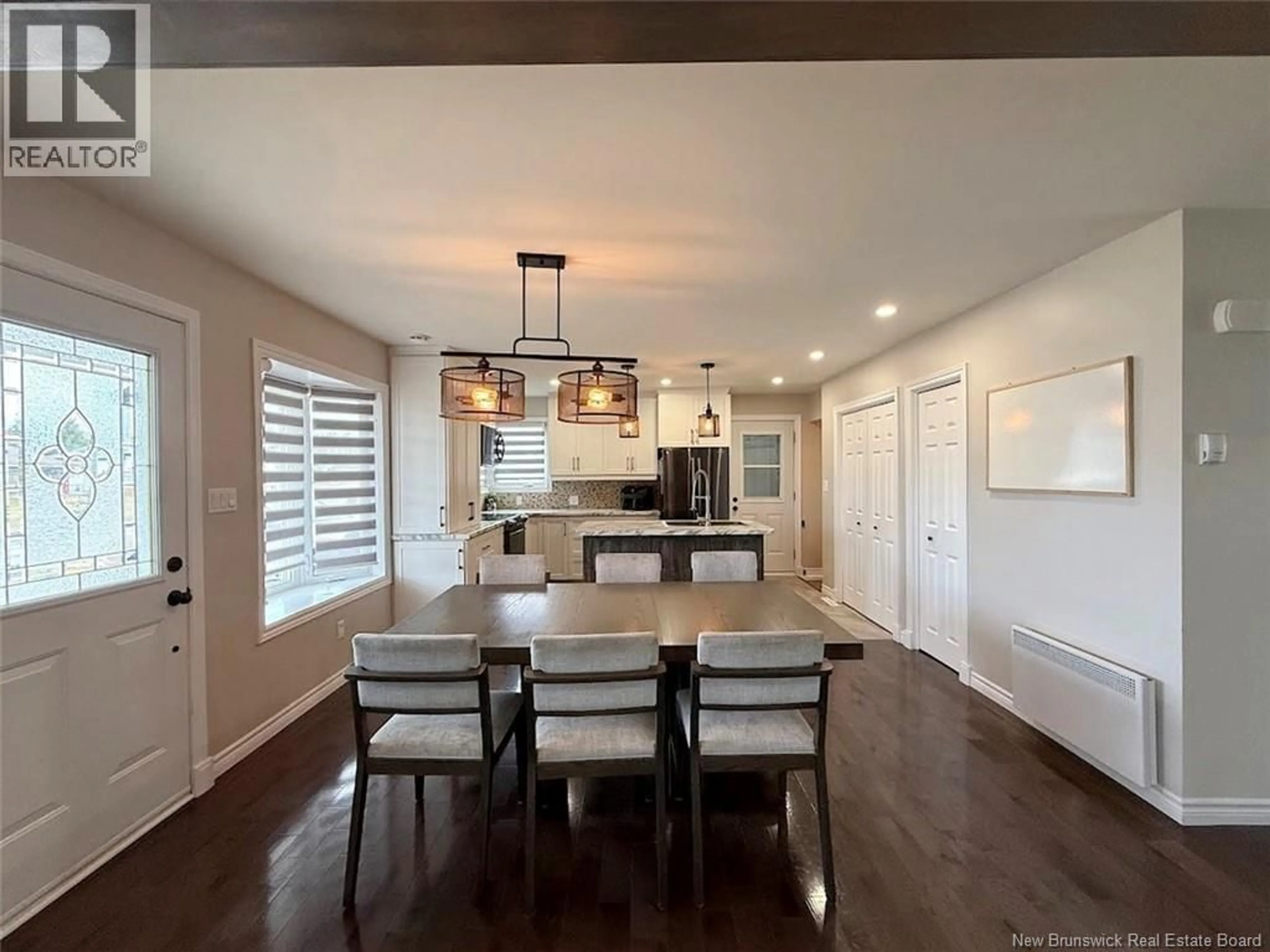 Open concept kitchen, wood/laminate floor for 3 MOREAU STREET, Rivière-Verte New Brunswick E7C2S8