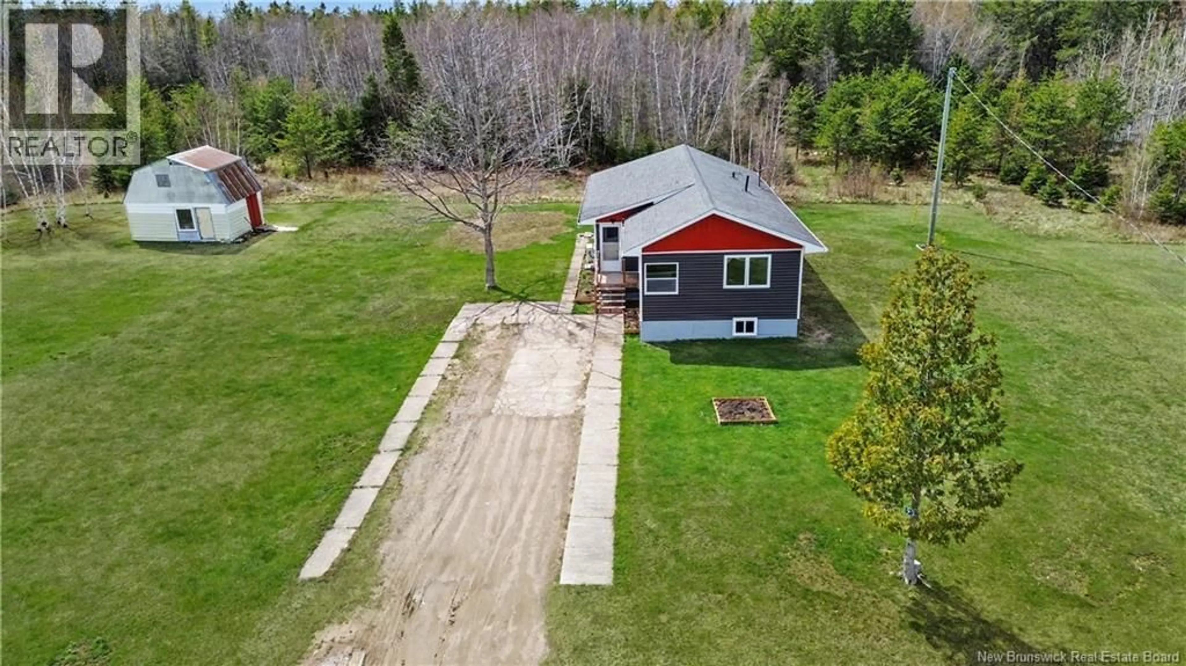 A pic from outside/outdoor area/front of a property/back of a property/a pic from drone, unknown for 931 SAINT PIERRE, Rogersville New Brunswick E4Y1L4
