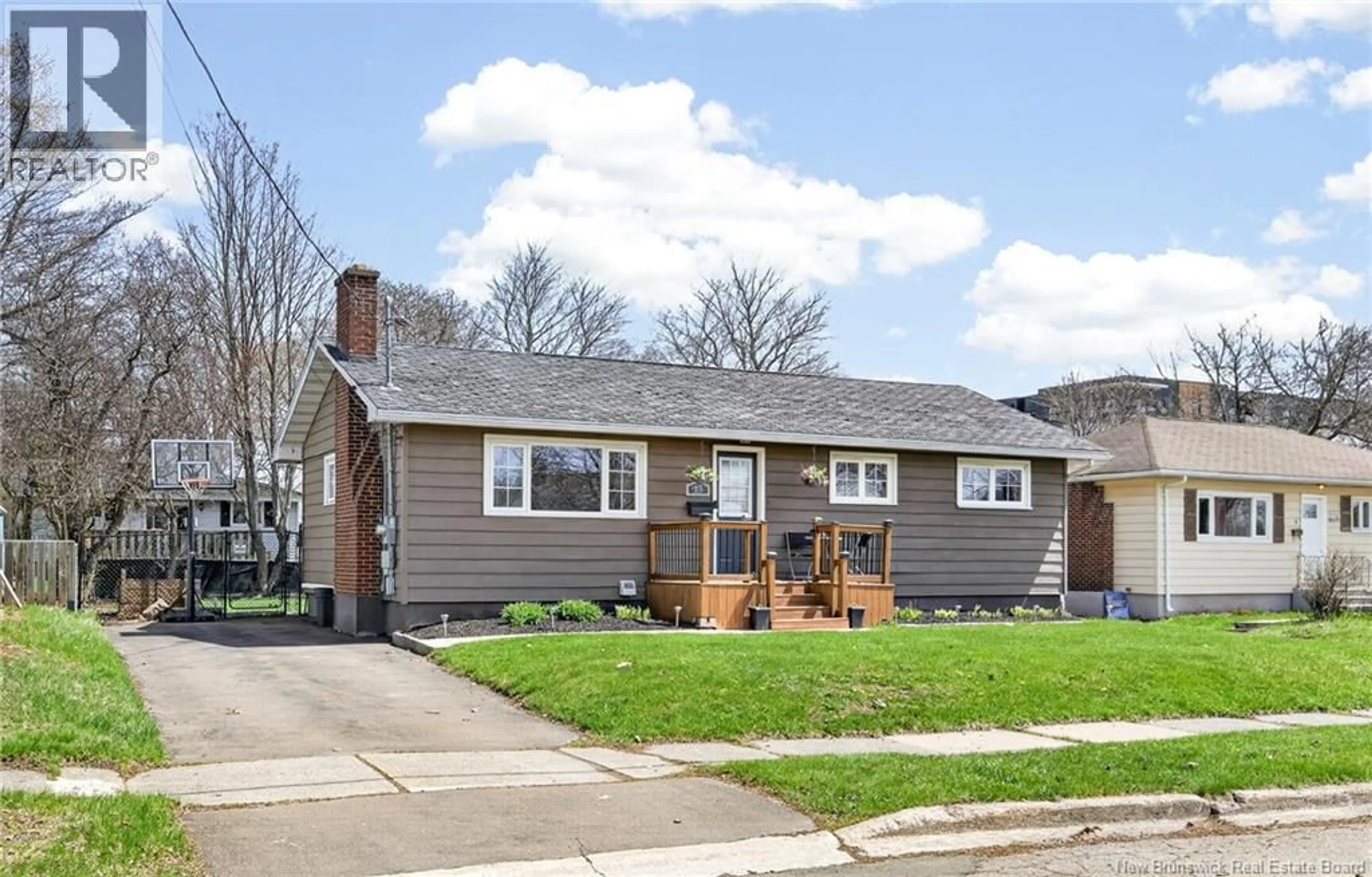 Home with vinyl exterior material, street for 15 BISSETT AVENUE, Moncton New Brunswick E1E2S8