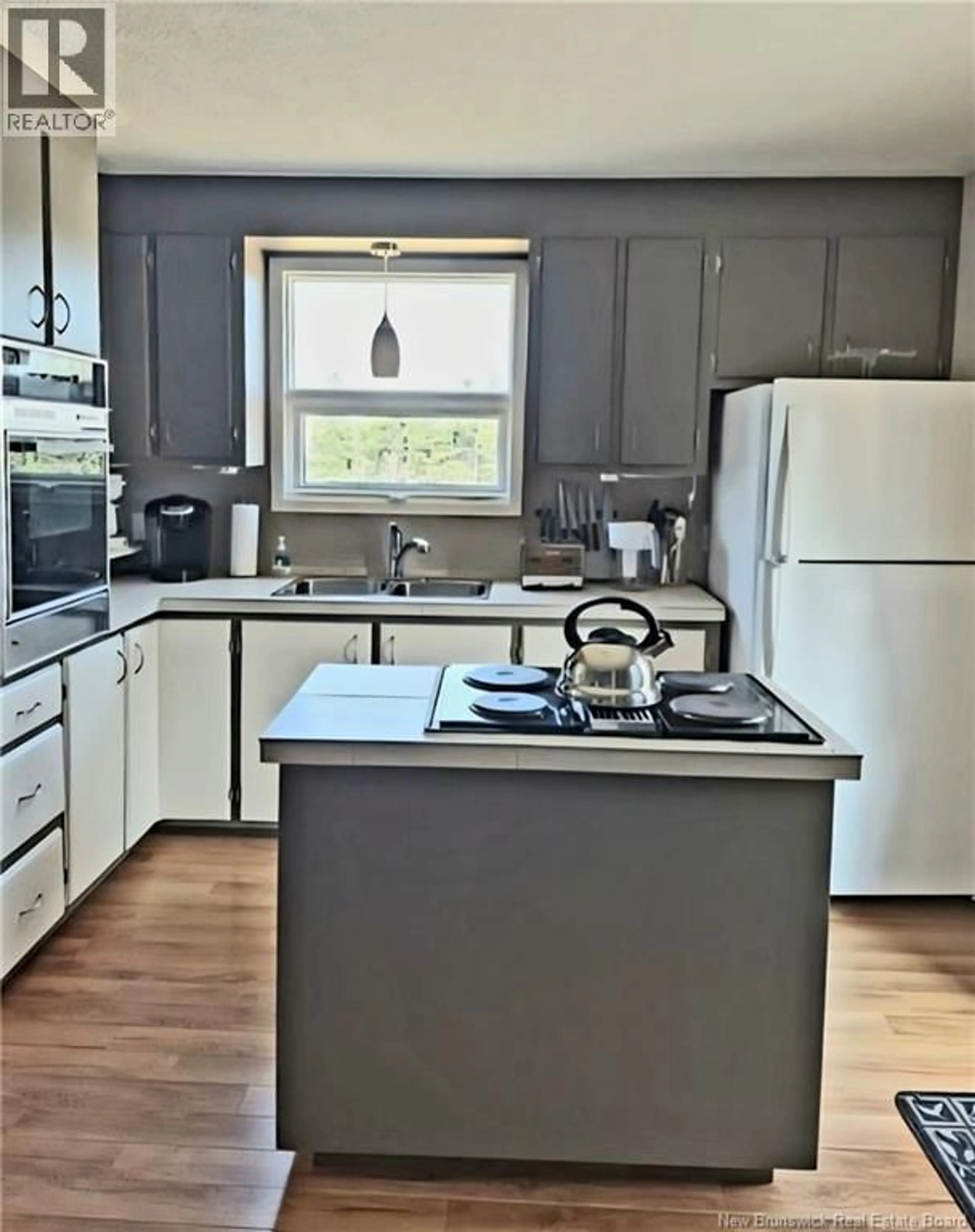 Open concept kitchen, unknown for 181 CHEMIN WARD, Miscou New Brunswick E8T2G5