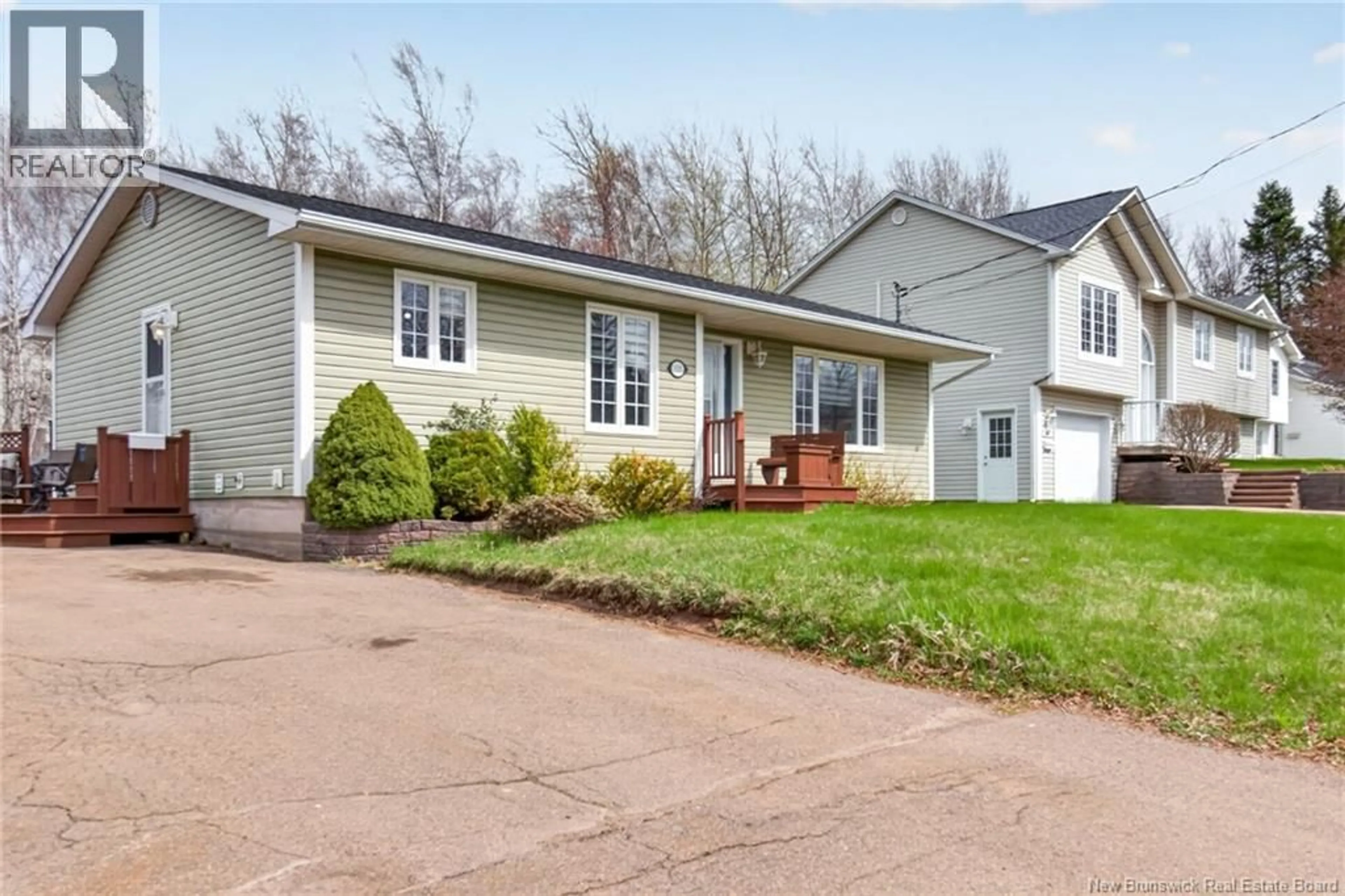 Home with vinyl exterior material, street for 111 THOMAS STREET, Dieppe New Brunswick E1A5W2