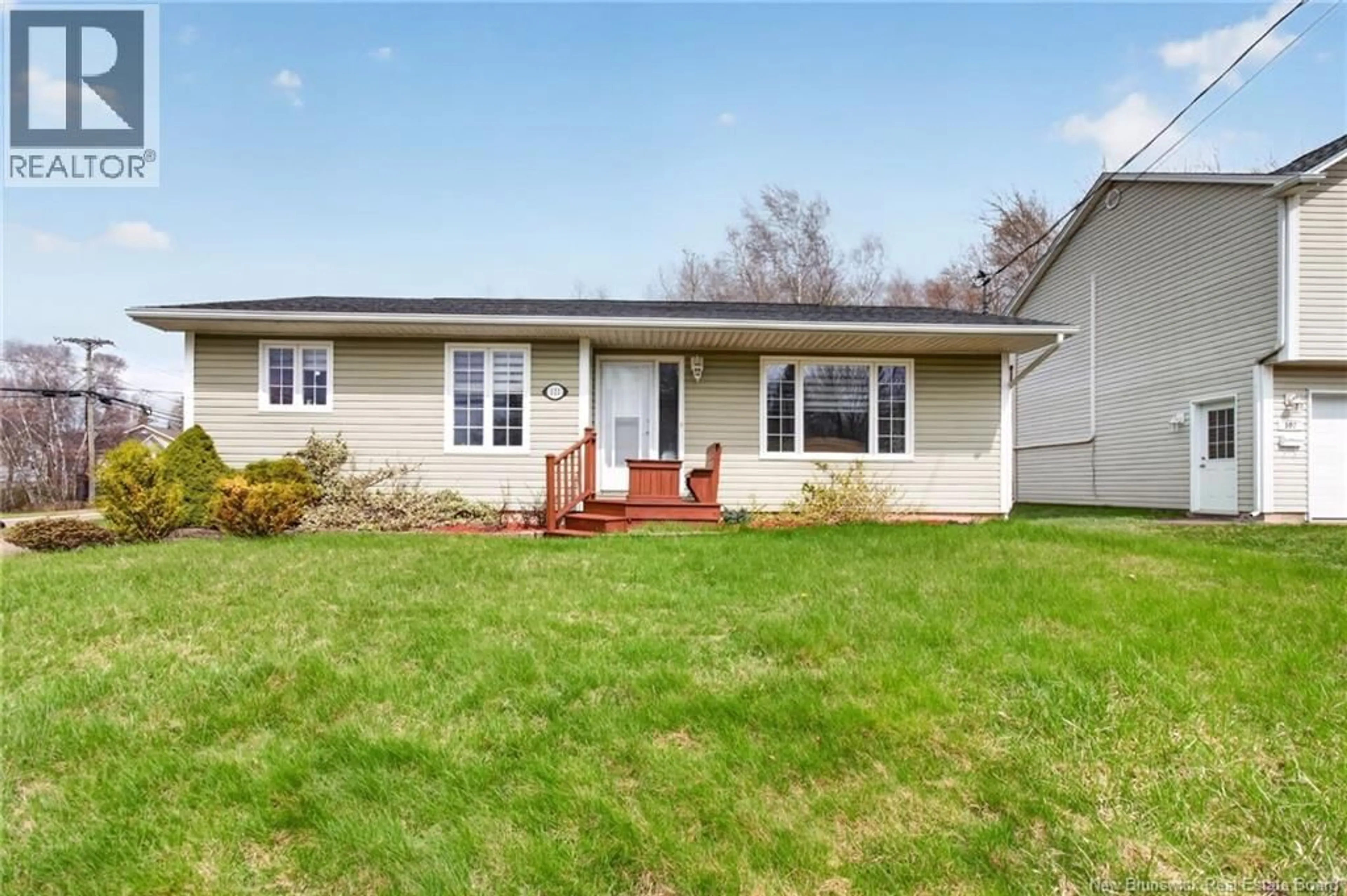Home with vinyl exterior material, street for 111 THOMAS STREET, Dieppe New Brunswick E1A5W2
