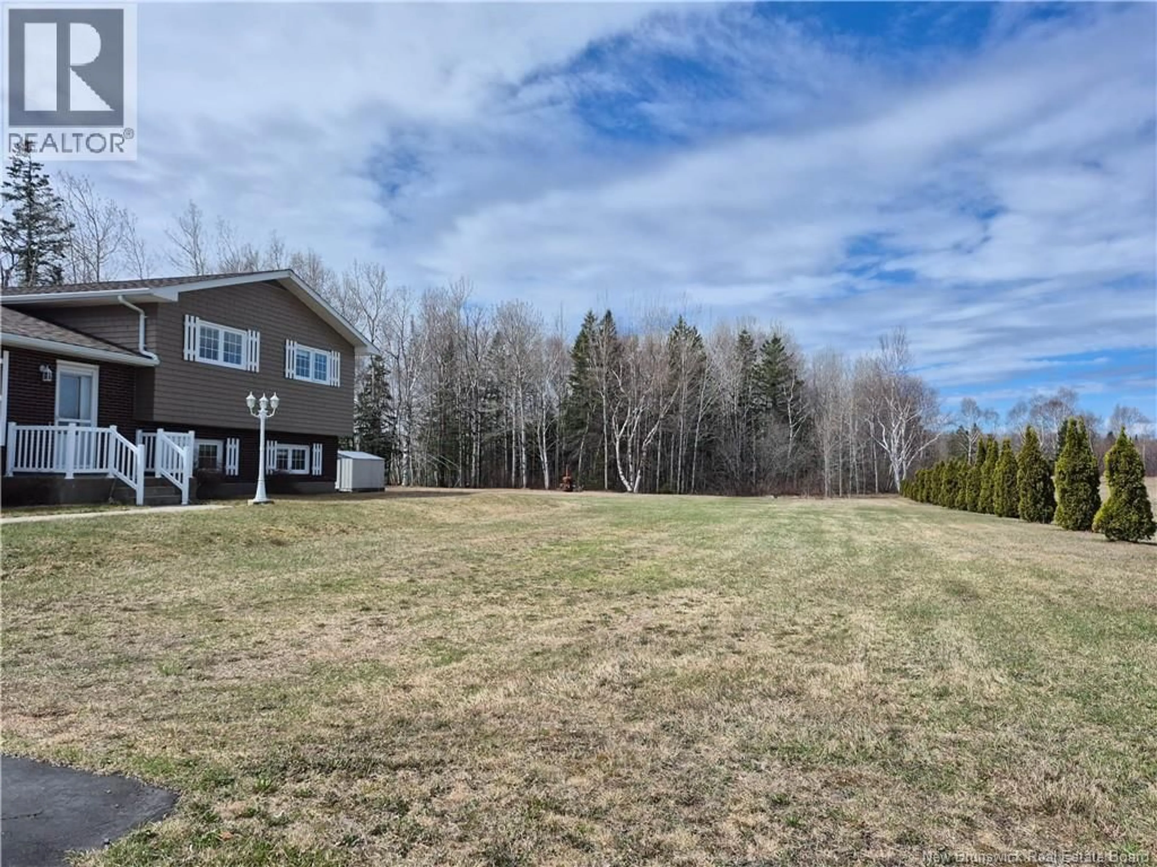 A pic from outside/outdoor area/front of a property/back of a property/a pic from drone, water/lake/river/ocean view for 48 RUE PIERRE, Tremblay New Brunswick E8J3C2