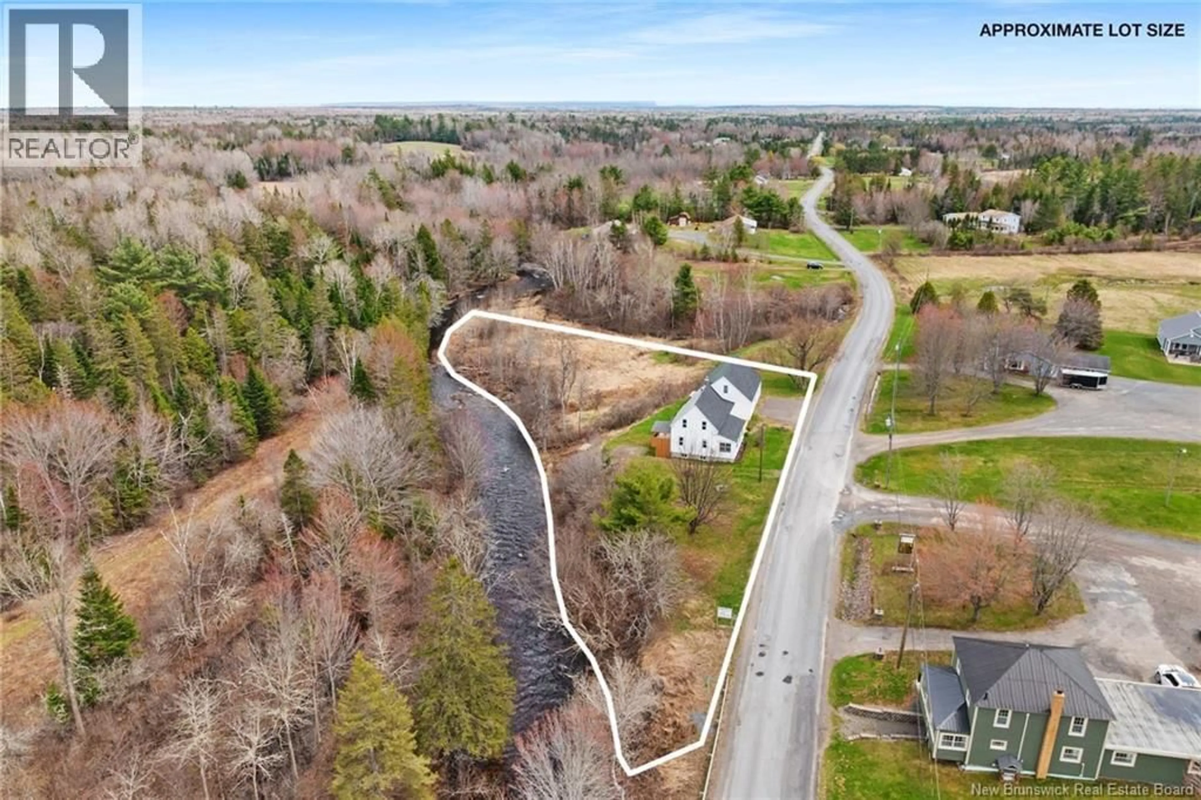 A pic from outside/outdoor area/front of a property/back of a property/a pic from drone, water/lake/river/ocean view for 57 PHILLIPS ROAD, Charters Settlement New Brunswick E3C1T7