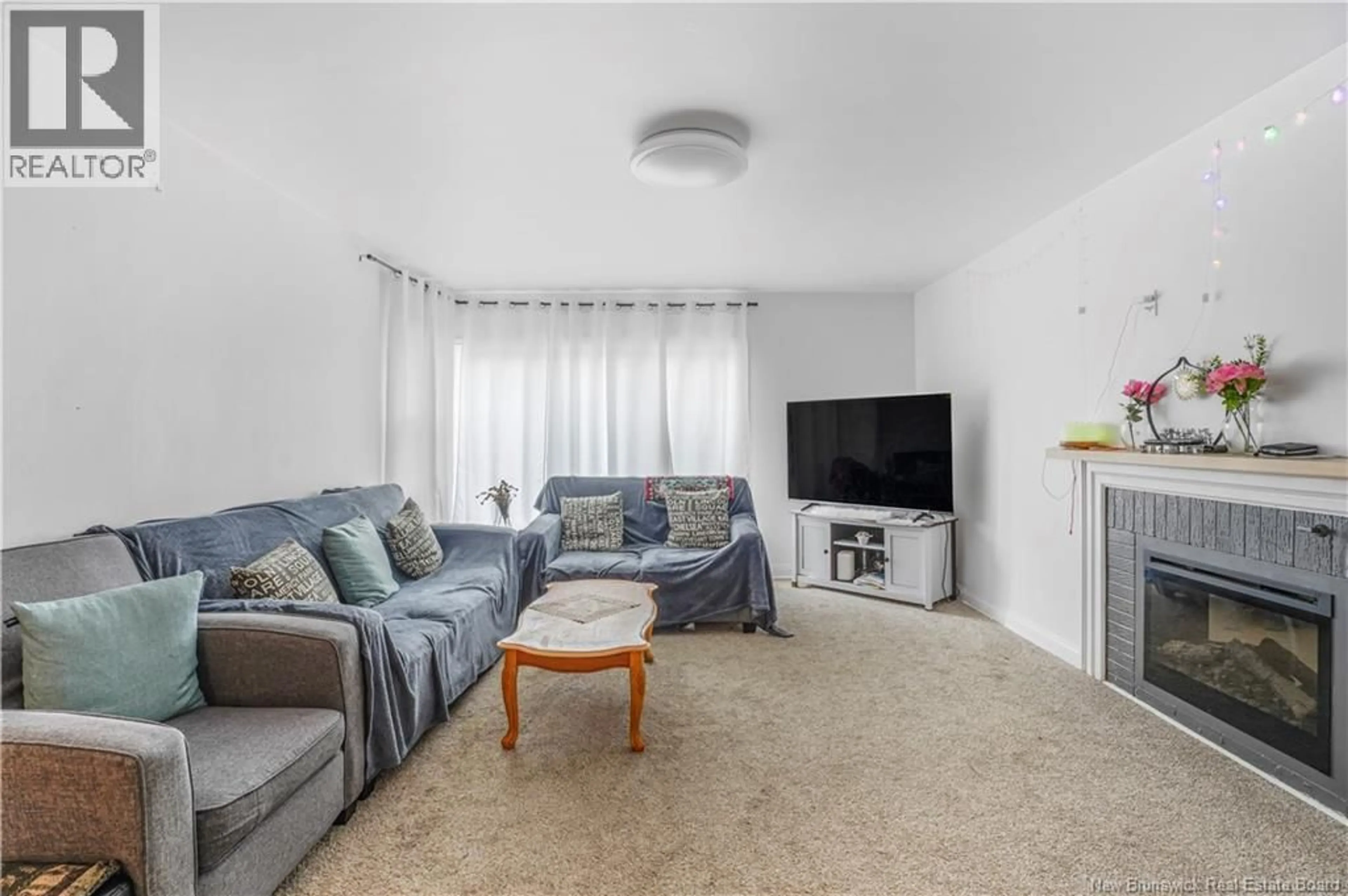 Living room with furniture, unknown for 532 CENTRAL COURT, Fredericton New Brunswick E3B3N2