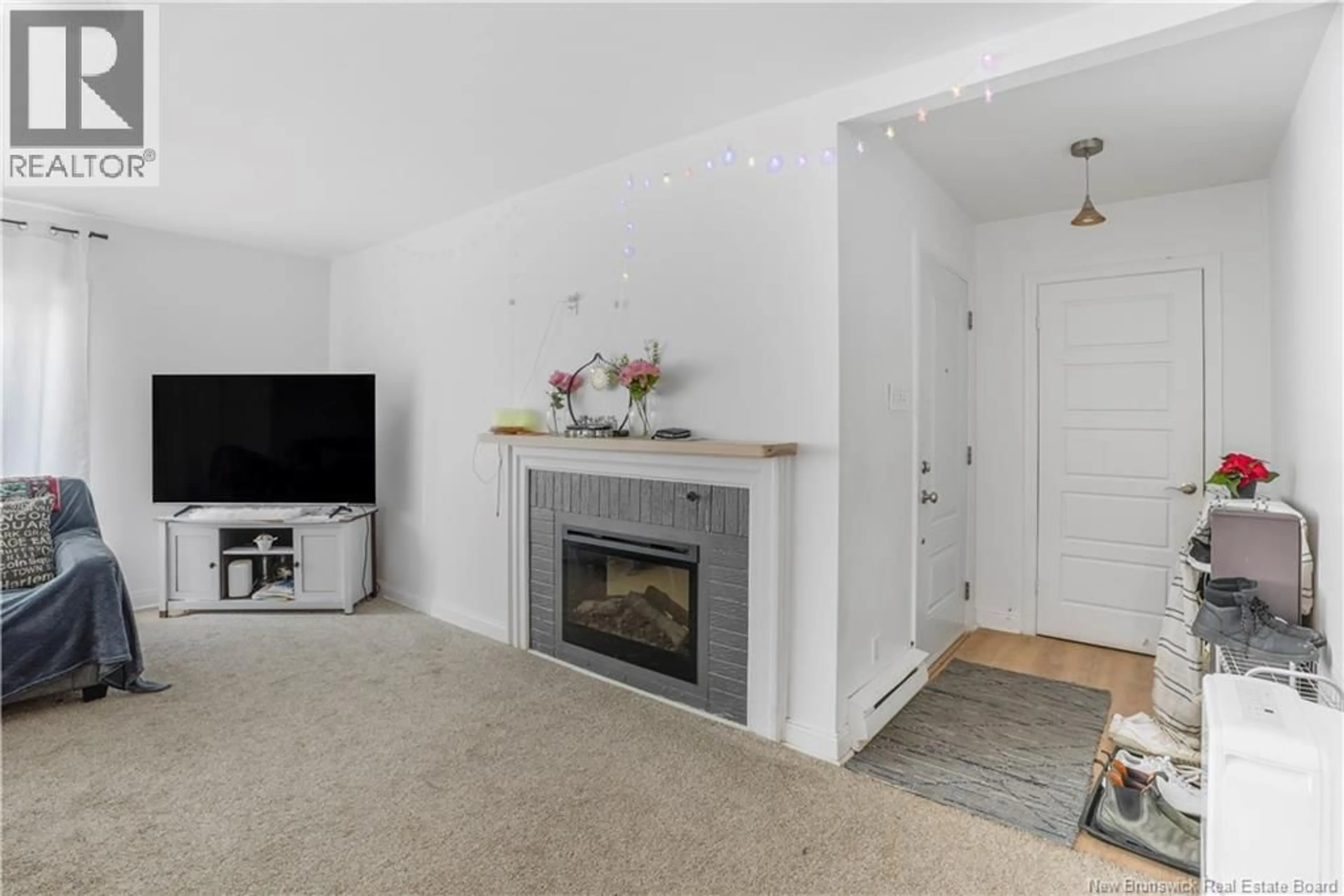 Living room with furniture, unknown for 532 CENTRAL COURT, Fredericton New Brunswick E3B3N2