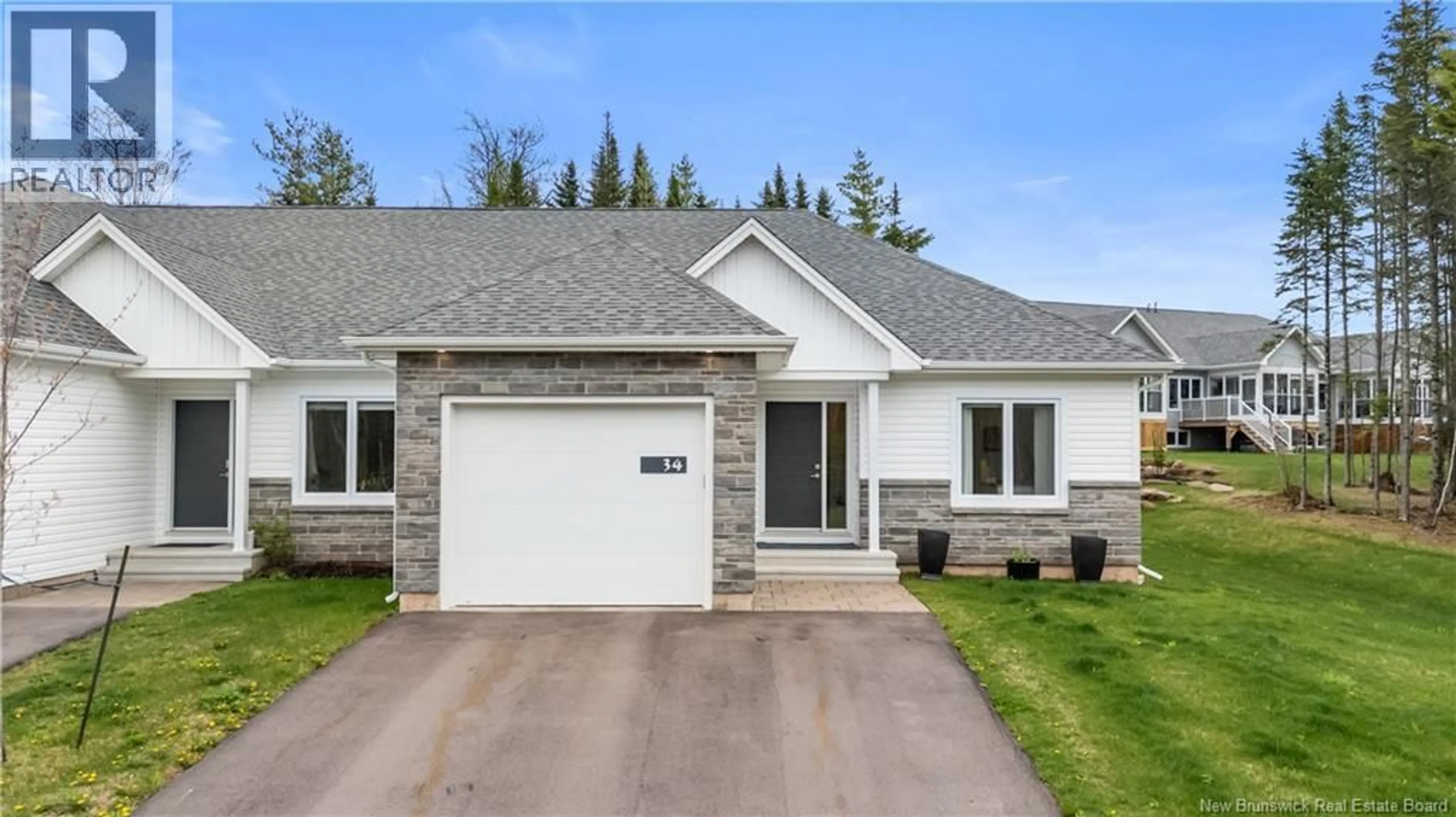 Home with vinyl exterior material, street for 34 BEAUBOIS, Dieppe New Brunswick E1A8N8